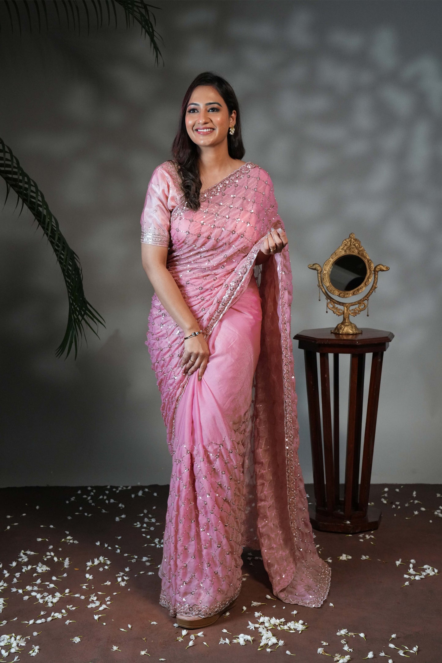 Pink geometric pattern stone work all over body designer saree with scallop design border matching blouse