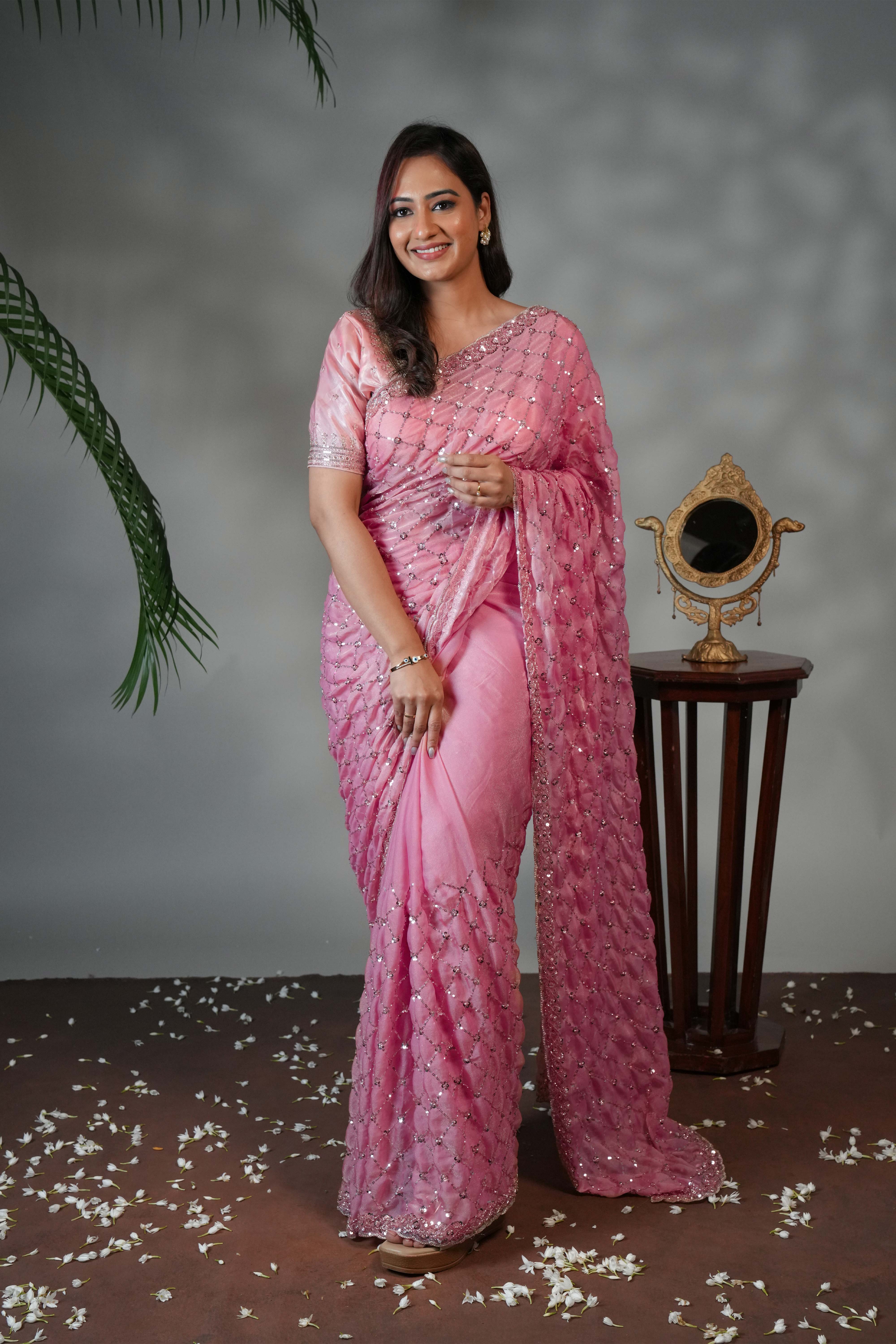 Pink geometric pattern stone work all over body designer saree with scallop design border matching blouse