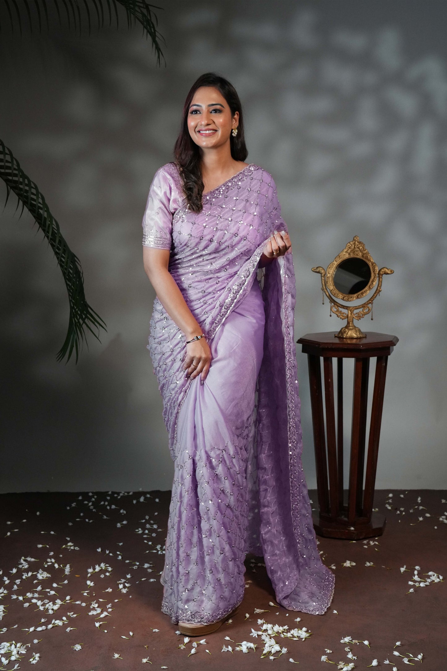 Lavender geometric pattern stone work all over body designer saree with scallop design border matching blouse