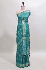 Green checked floral design dola silk saree with self zari border and matching blouse