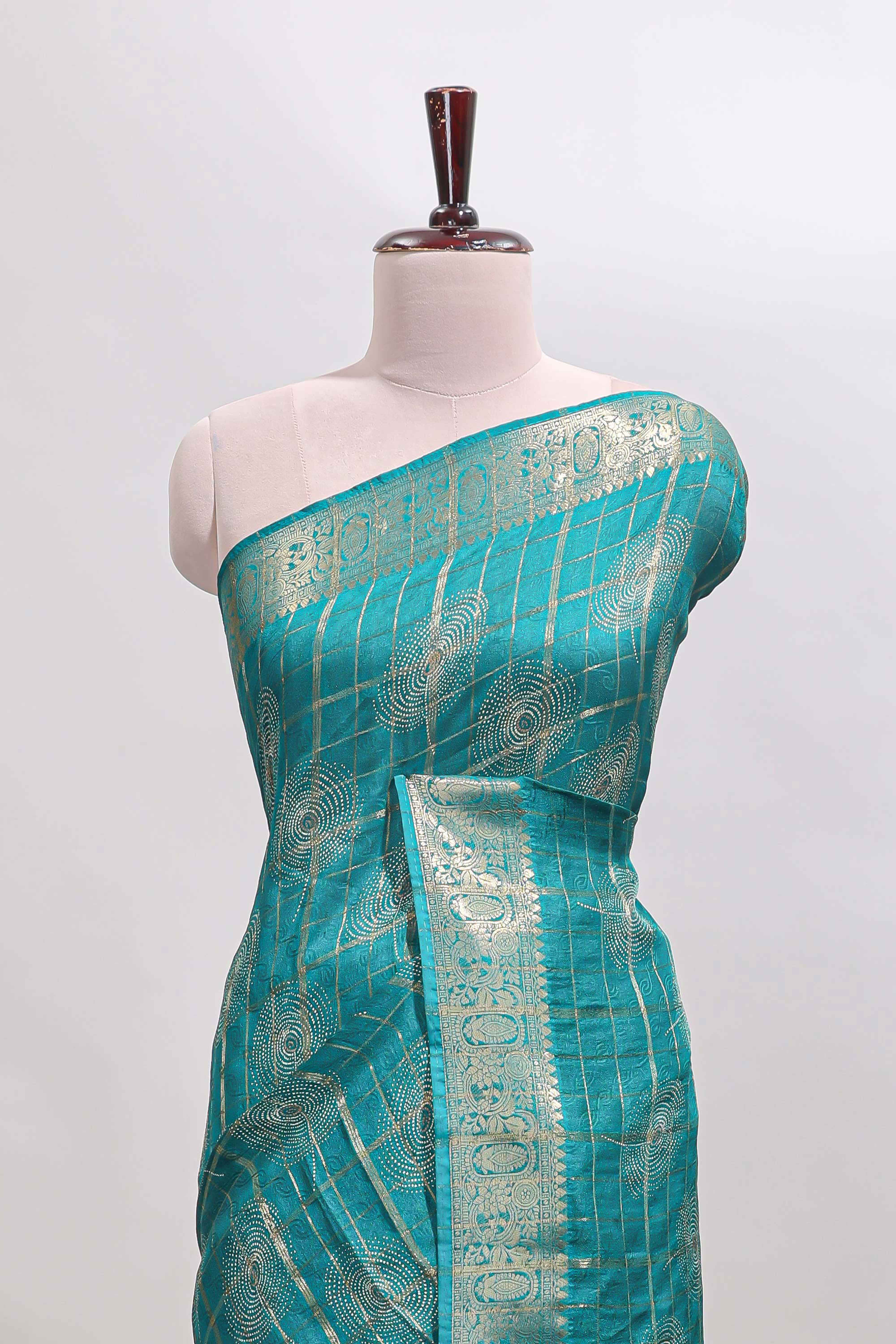 Green checked floral design dola silk saree with self zari border and matching blouse