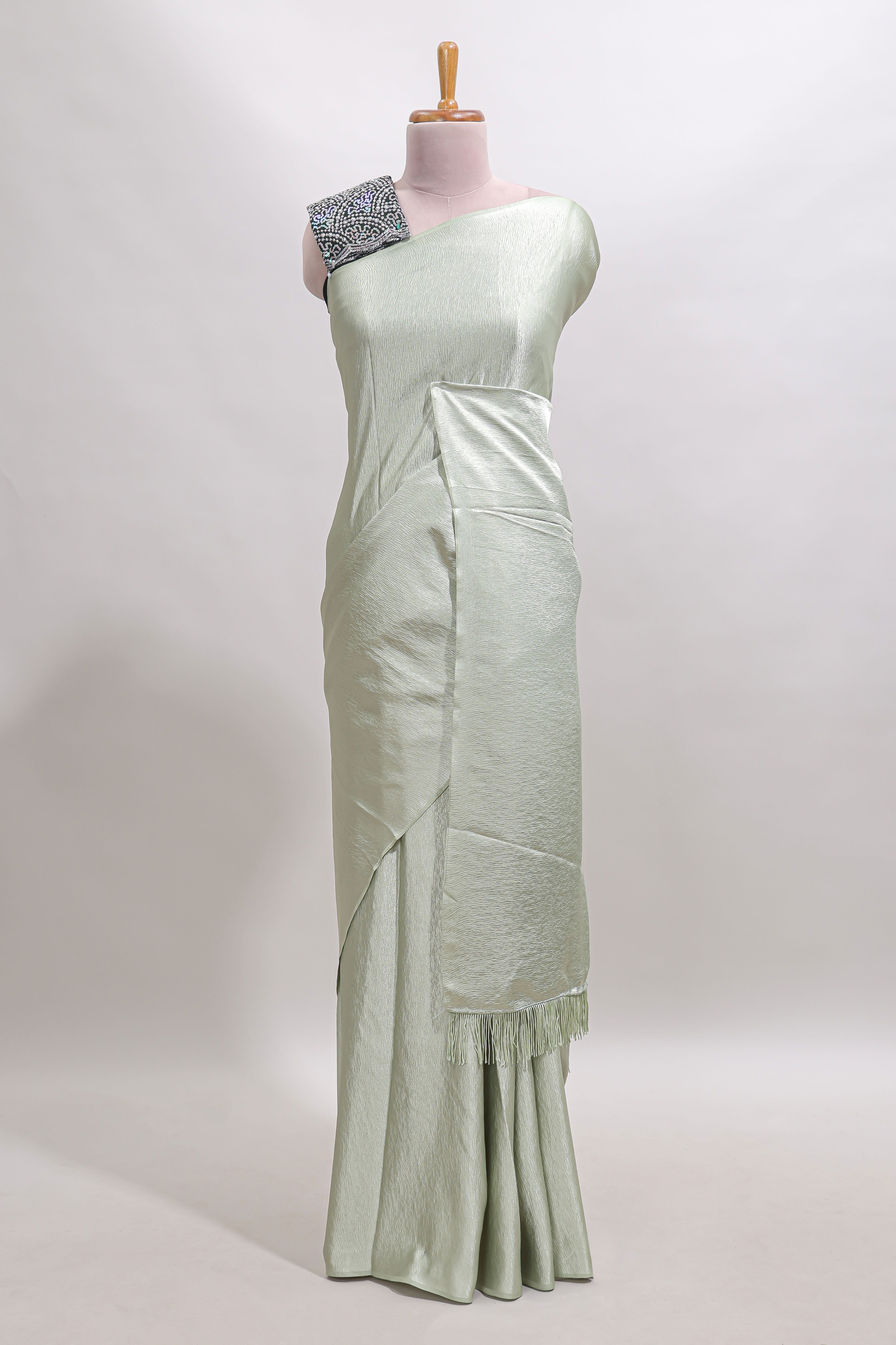 Borderless green plain chiffon saree with contrast embroidery blouse