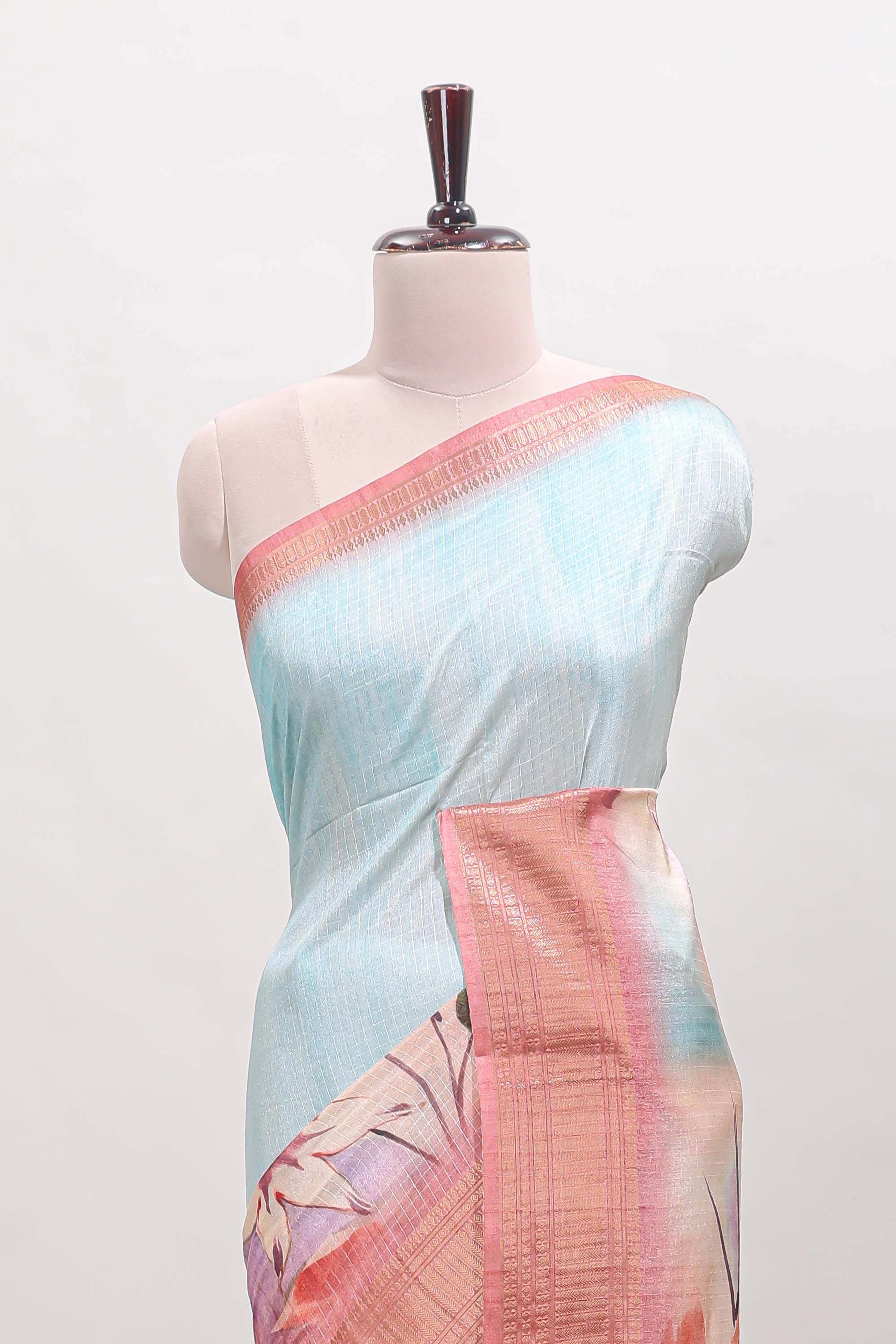 Blue checked floral design dola silk saree with contrast zari border and matching blouse