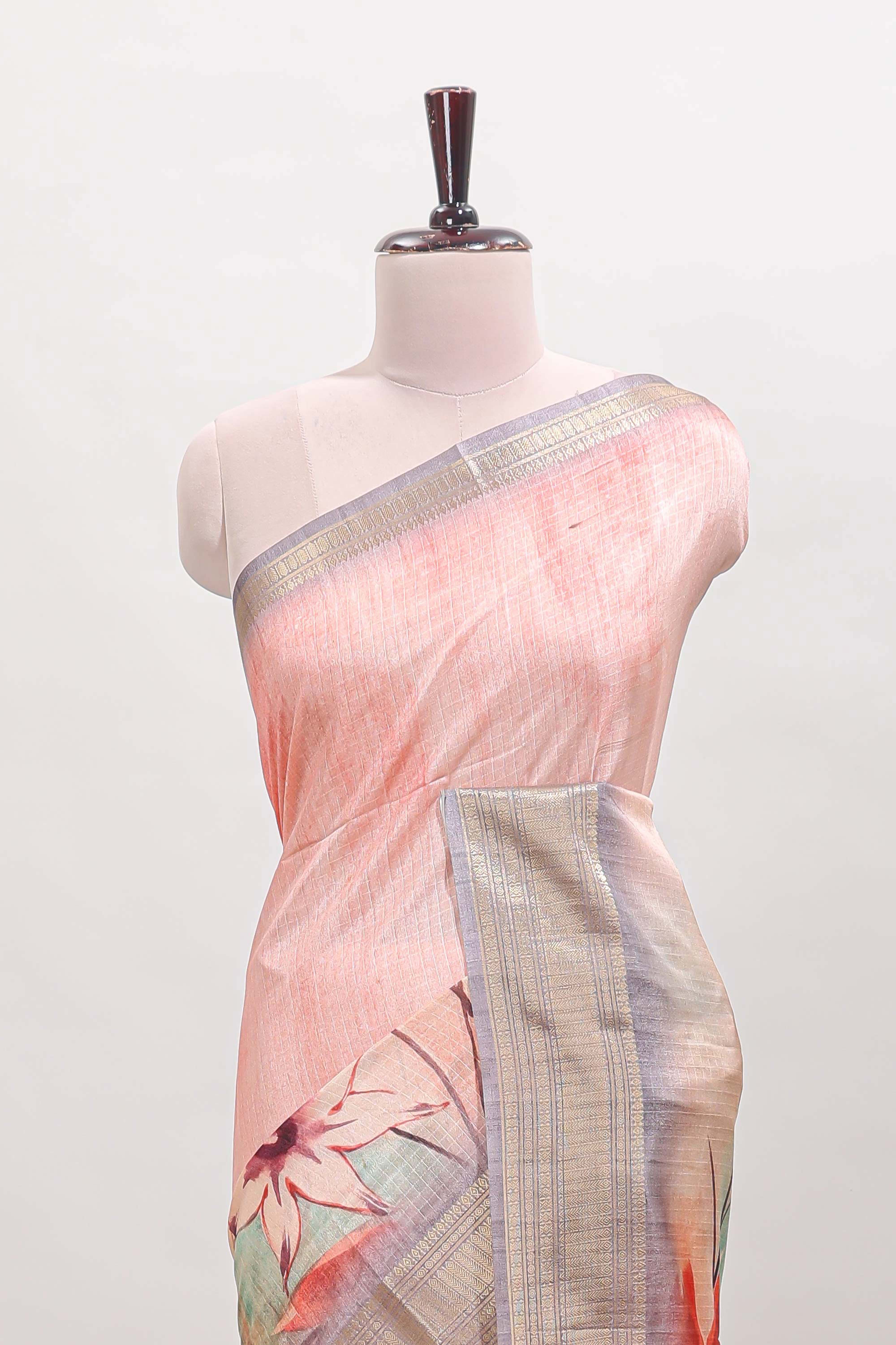 Pink checked floral design dola silk saree with contrast zari border and matching blouse