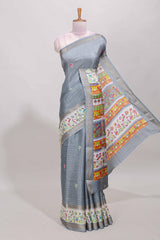 Grey dola silk saree with striped floral motifs and bird & floral bottom design with self zari border and matching blouse