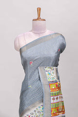 Grey dola silk saree with striped floral motifs and bird & floral bottom design with self zari border and matching blouse