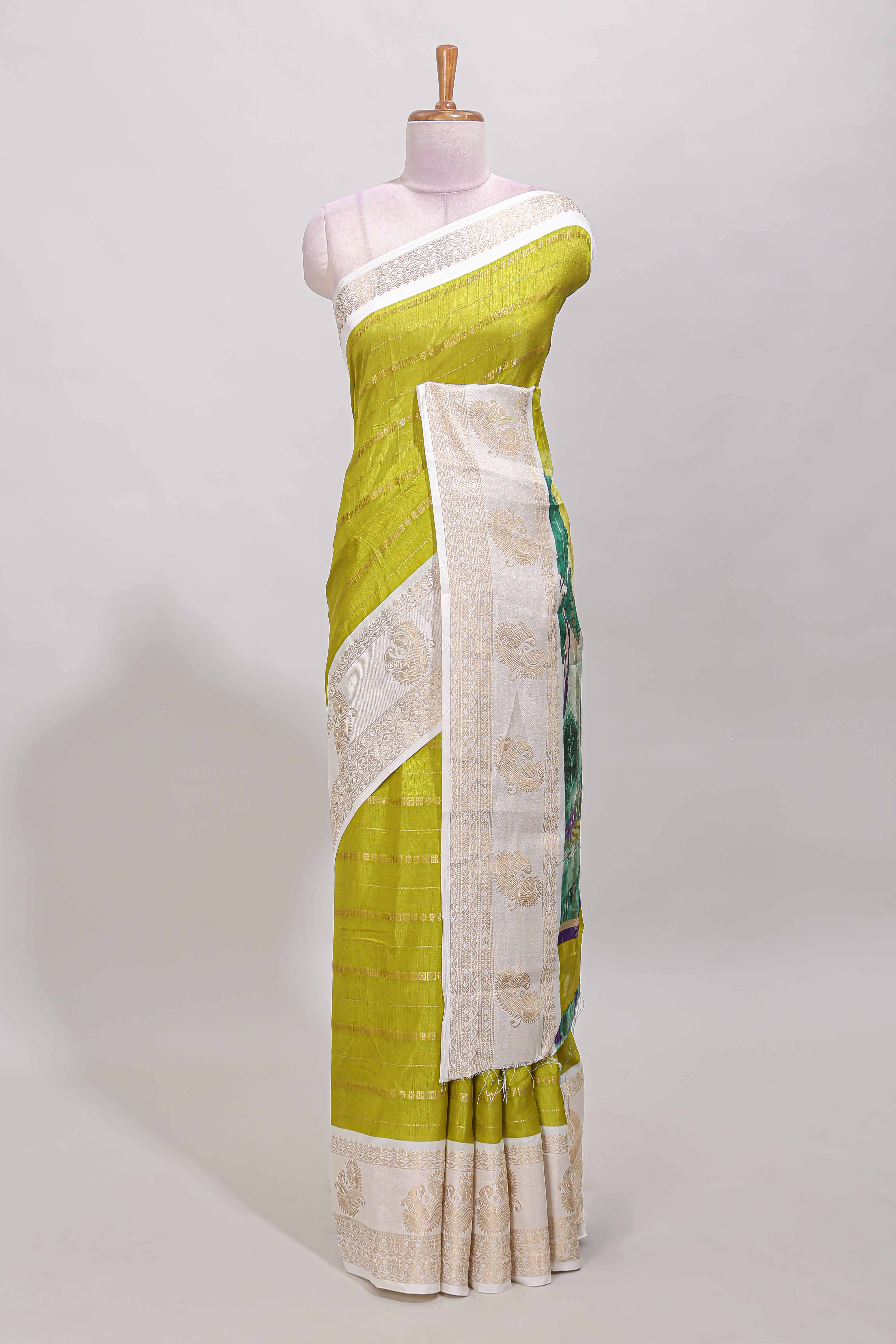 Green zari striped dola silk saree with contrast zari border and printed pallu