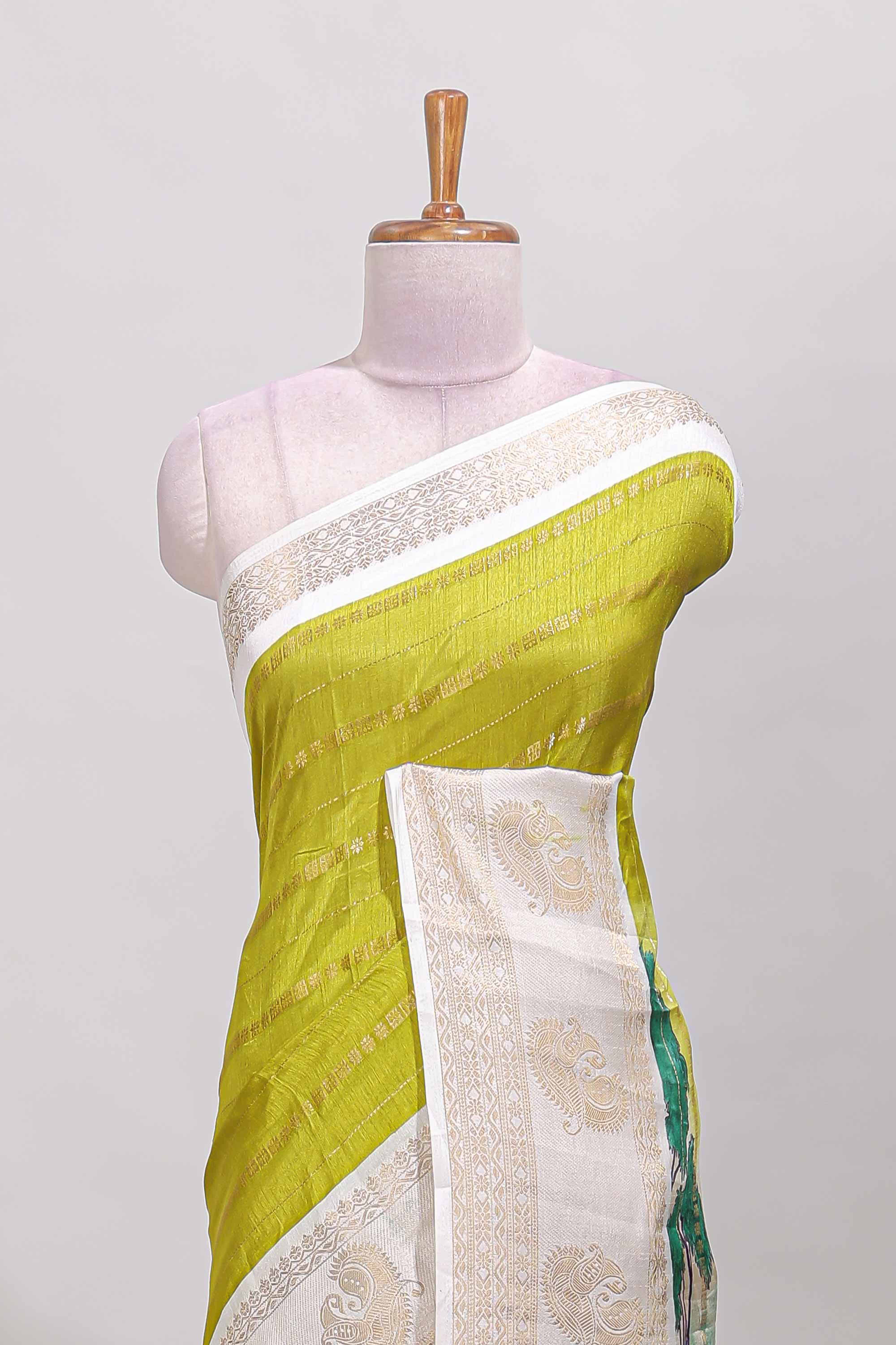 Green zari striped dola silk saree with contrast zari border and printed pallu