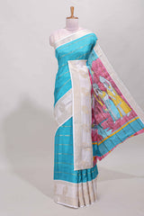 Blue zari striped dola silk saree with contrast zari border and printed pallu