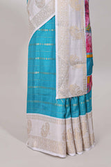Blue zari striped dola silk saree with contrast zari border and printed pallu