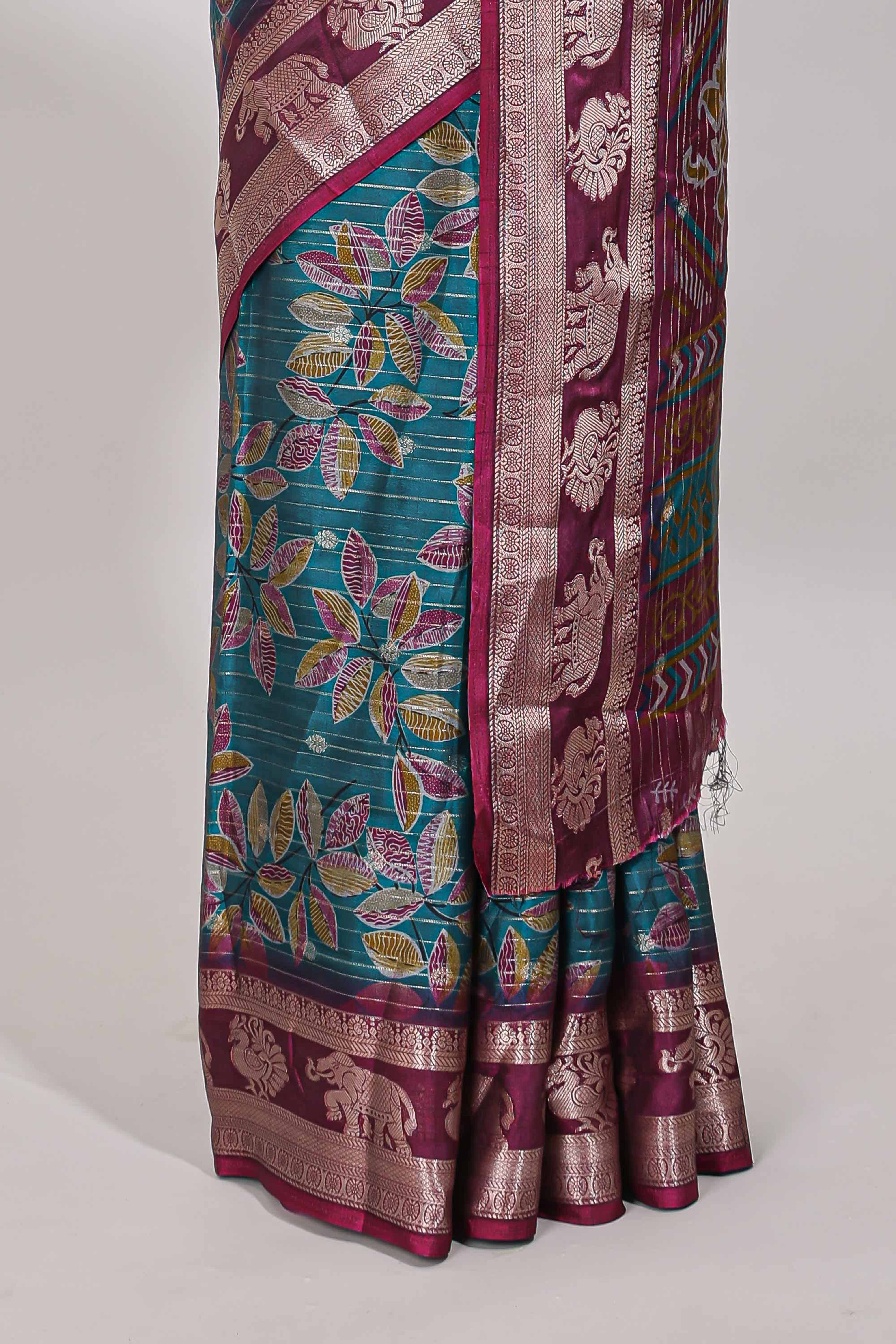 Green zari striped floral design dola silk saree with contrast zari border and printed blouse
