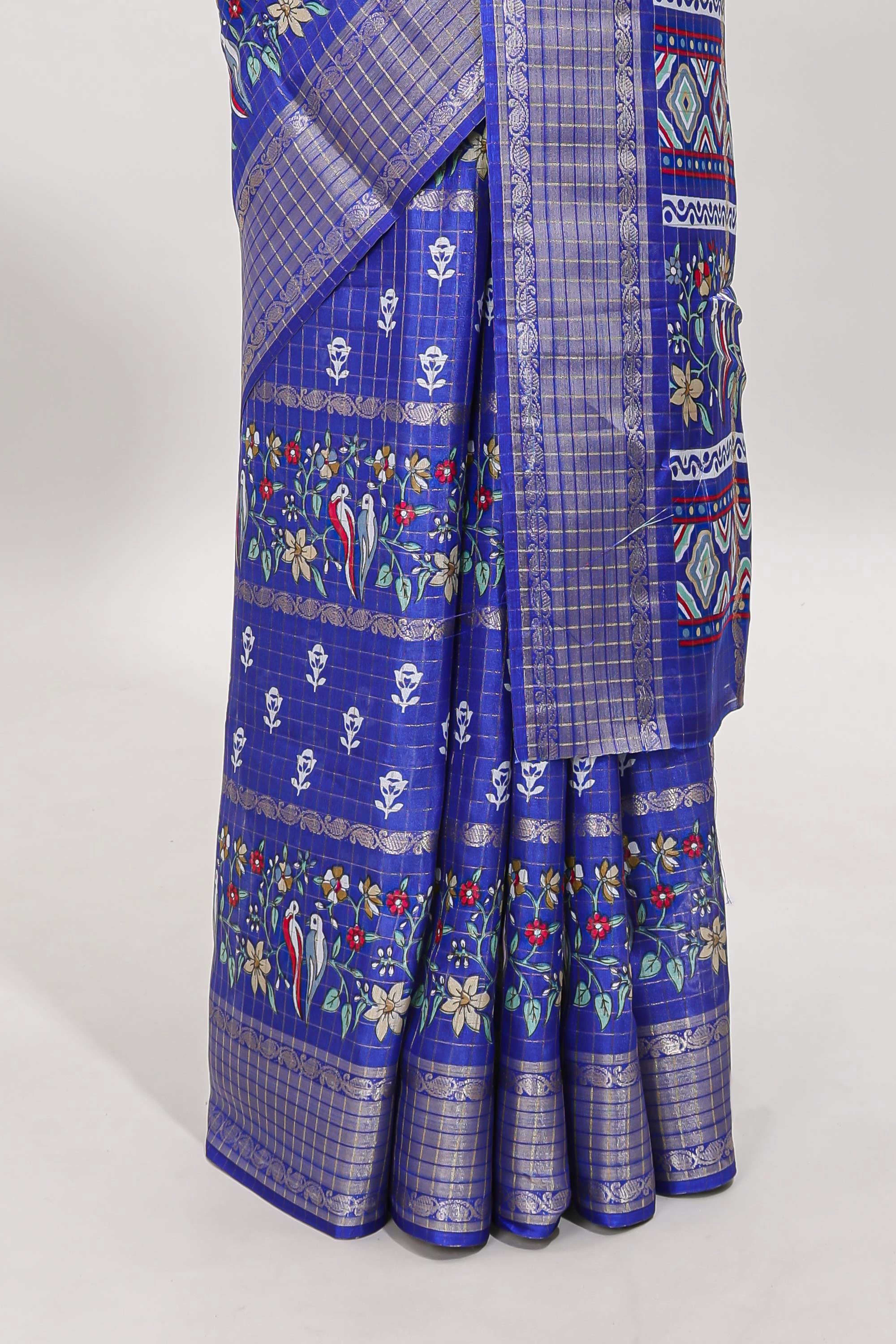Blue checked floral design dola saree with self zari border and matching blouse