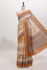 Brown shibori style chanderi cotton saree with contrast mustard border and blouse