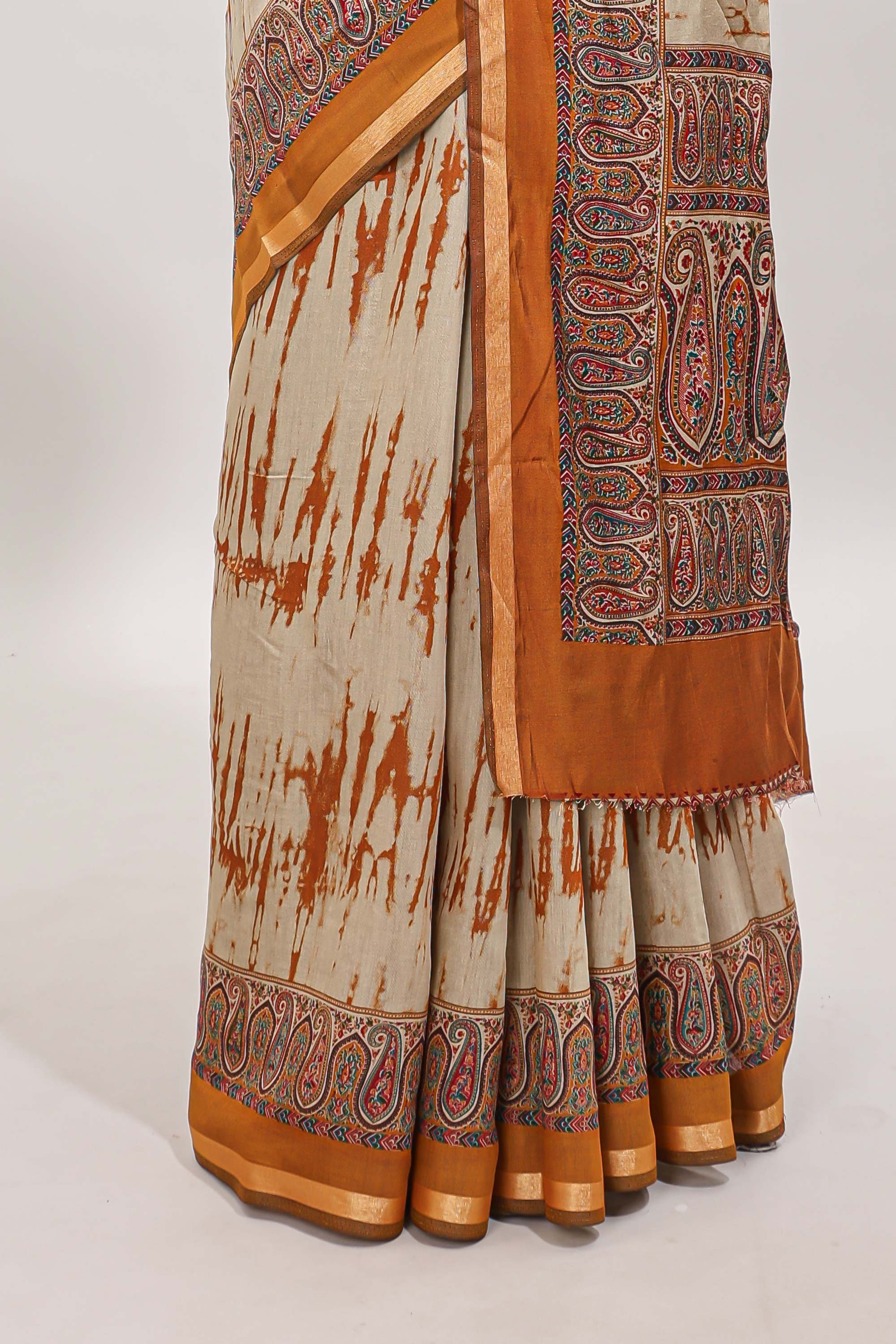 Brown shibori style chanderi cotton saree with contrast mustard border and blouse