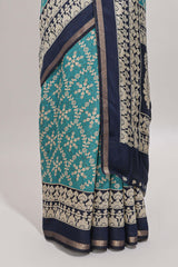Turquoise green floral vine print chanderi cotton saree with contrast border and blouse