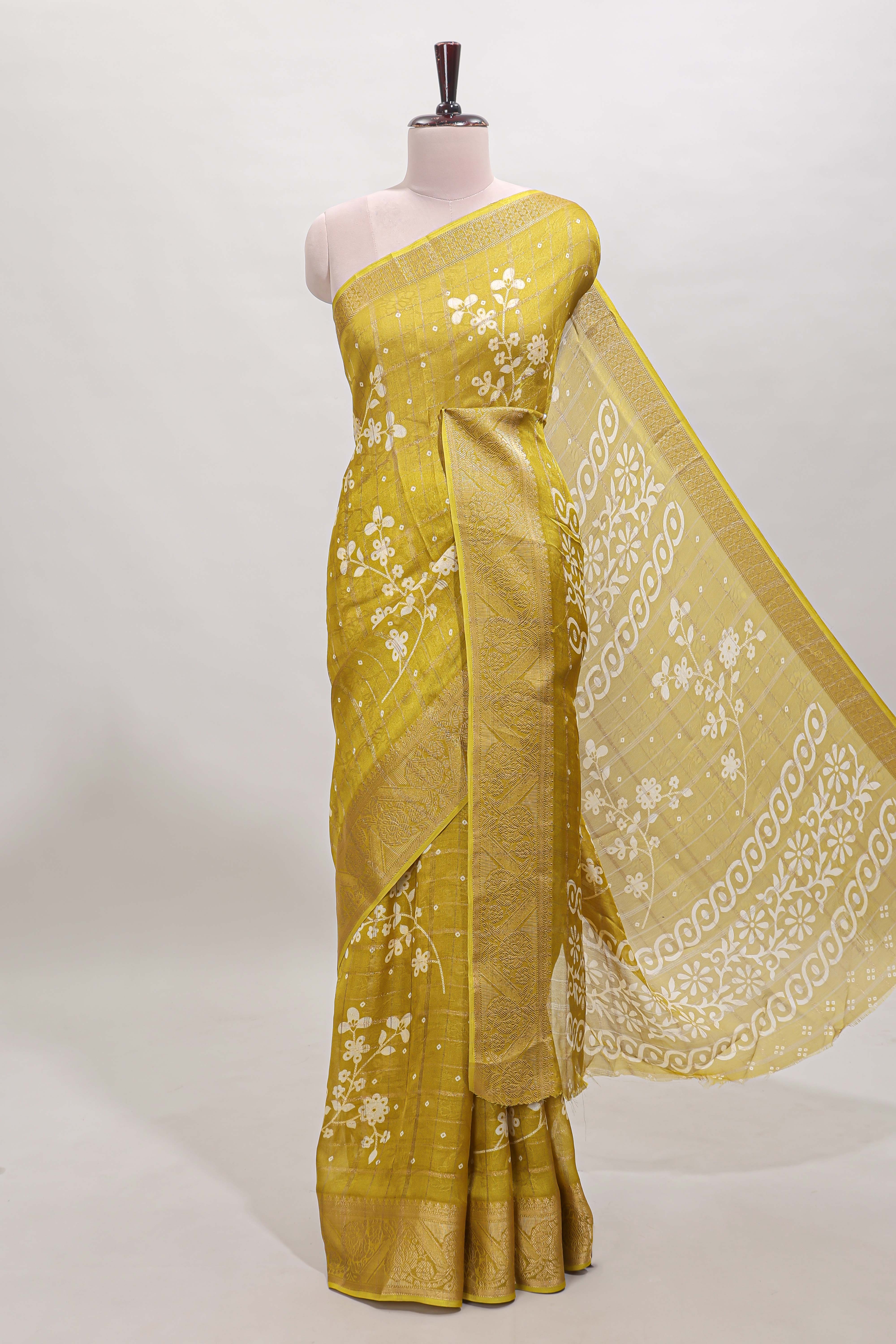 Mustard checked floral design dola saree with self zari border and matching blouse