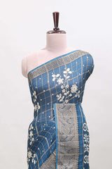 Blue checked floral design dola saree with self zari border and matching blouse
