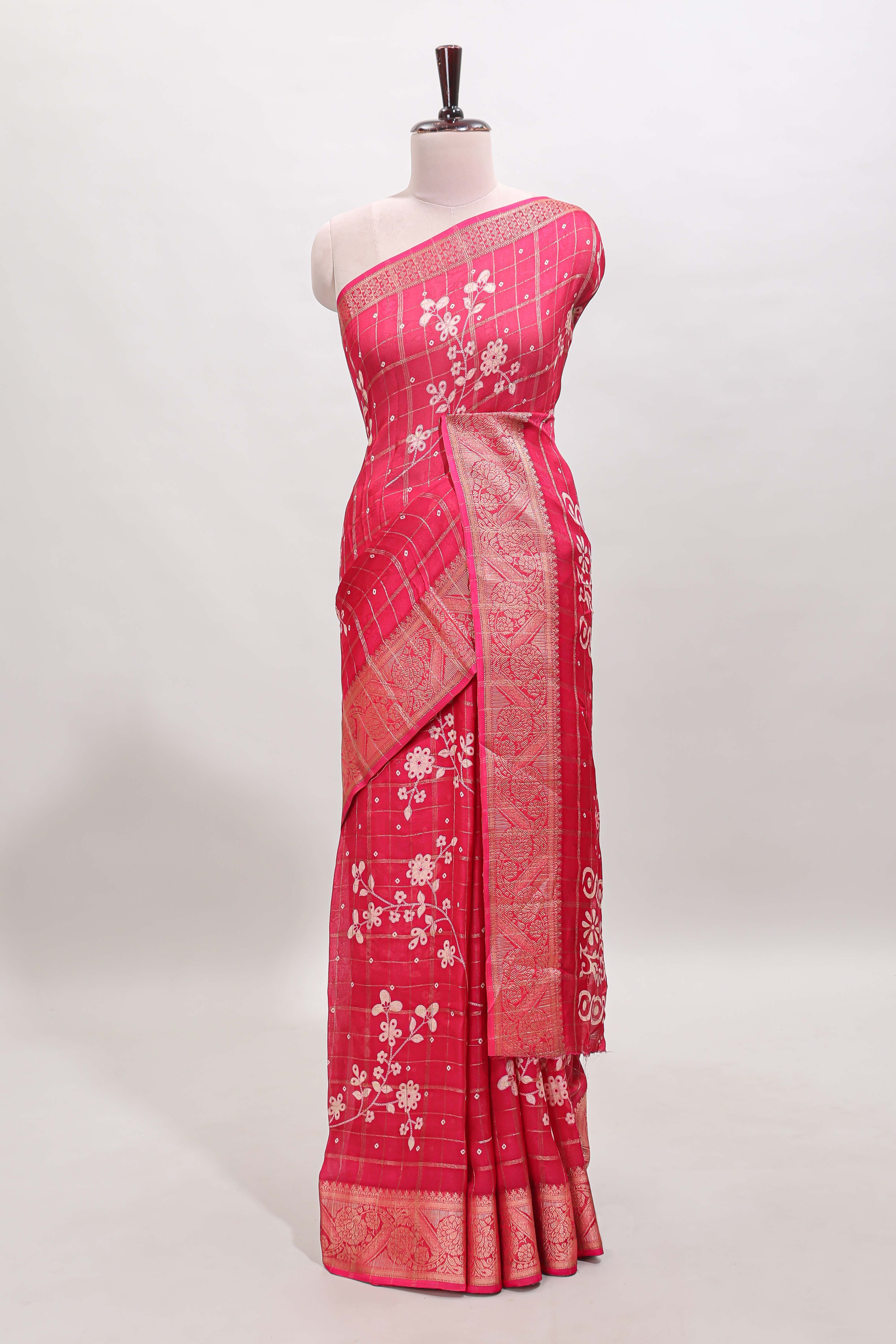 Pink checked floral design dola saree with self zari border and matching blouse