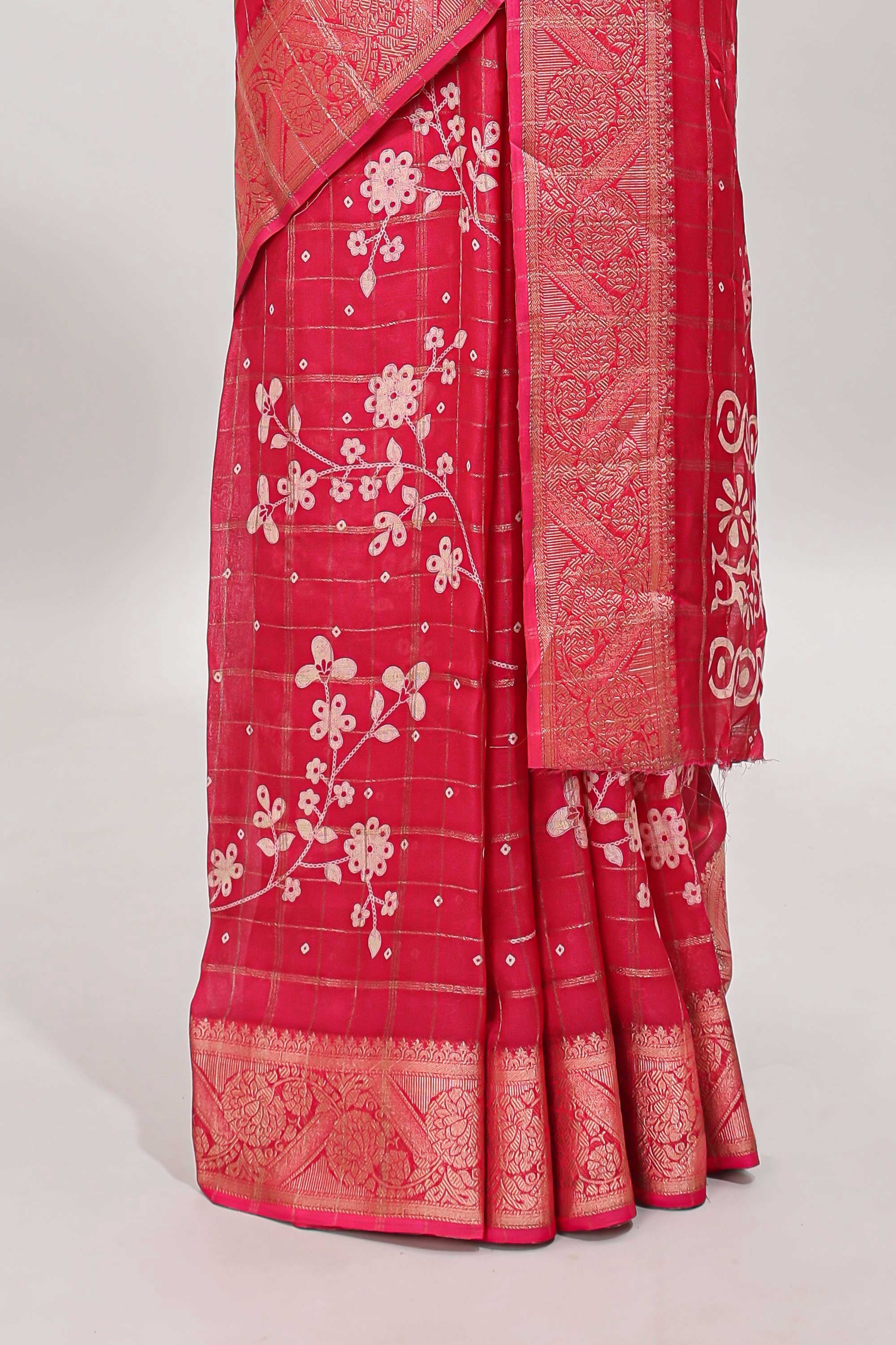Pink checked floral design dola saree with self zari border and matching blouse