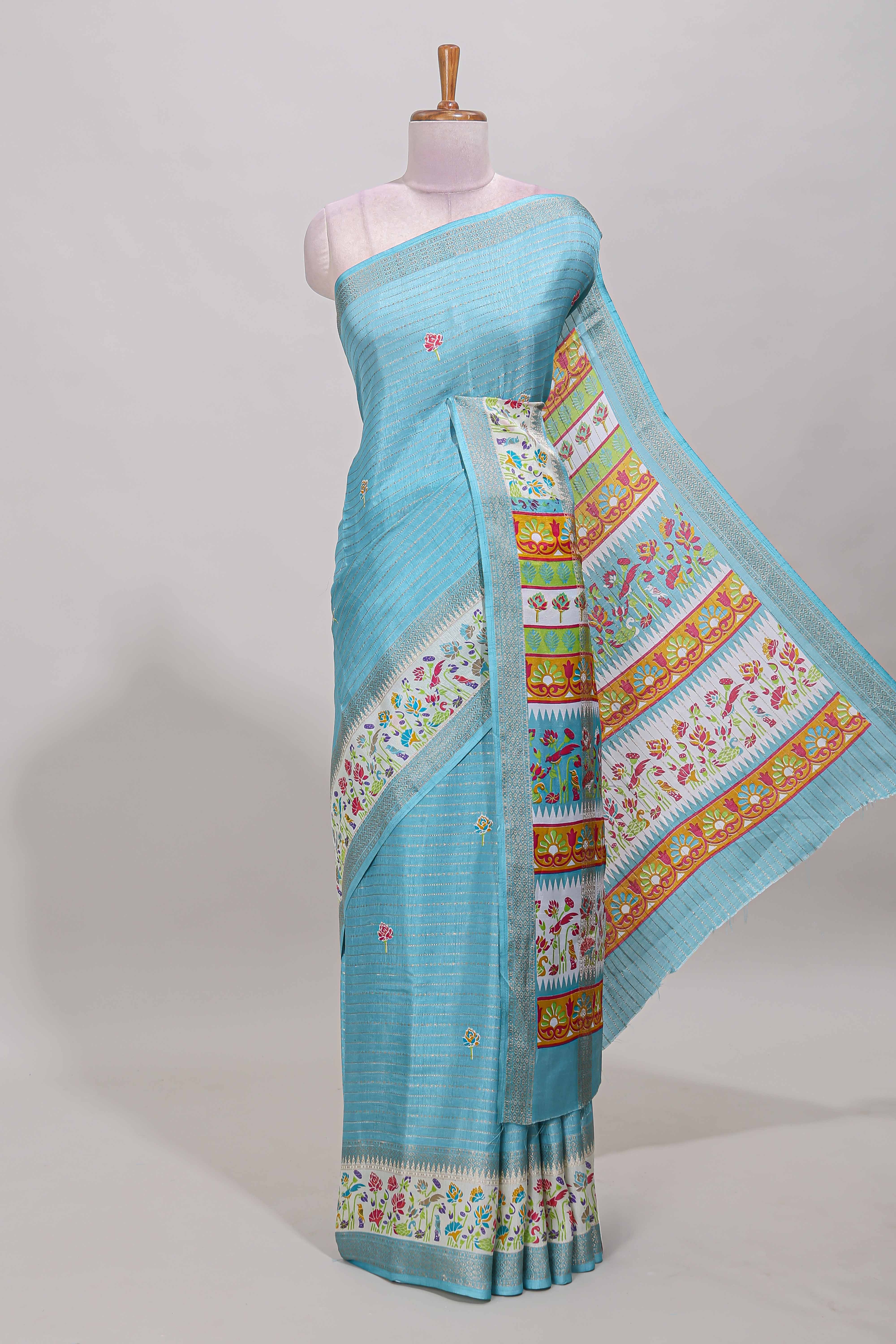 Blue dola silk saree with striped floral motifs and bird & floral bottom design with self zari border and matching blouse