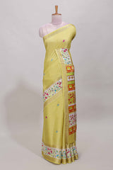 Yellow dola silk saree with striped floral motifs and bird & floral bottom design with self zari border and matching blouse
