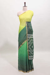 Yellow and green dual shade checked linen cotton saree with self zari border and matching blouse