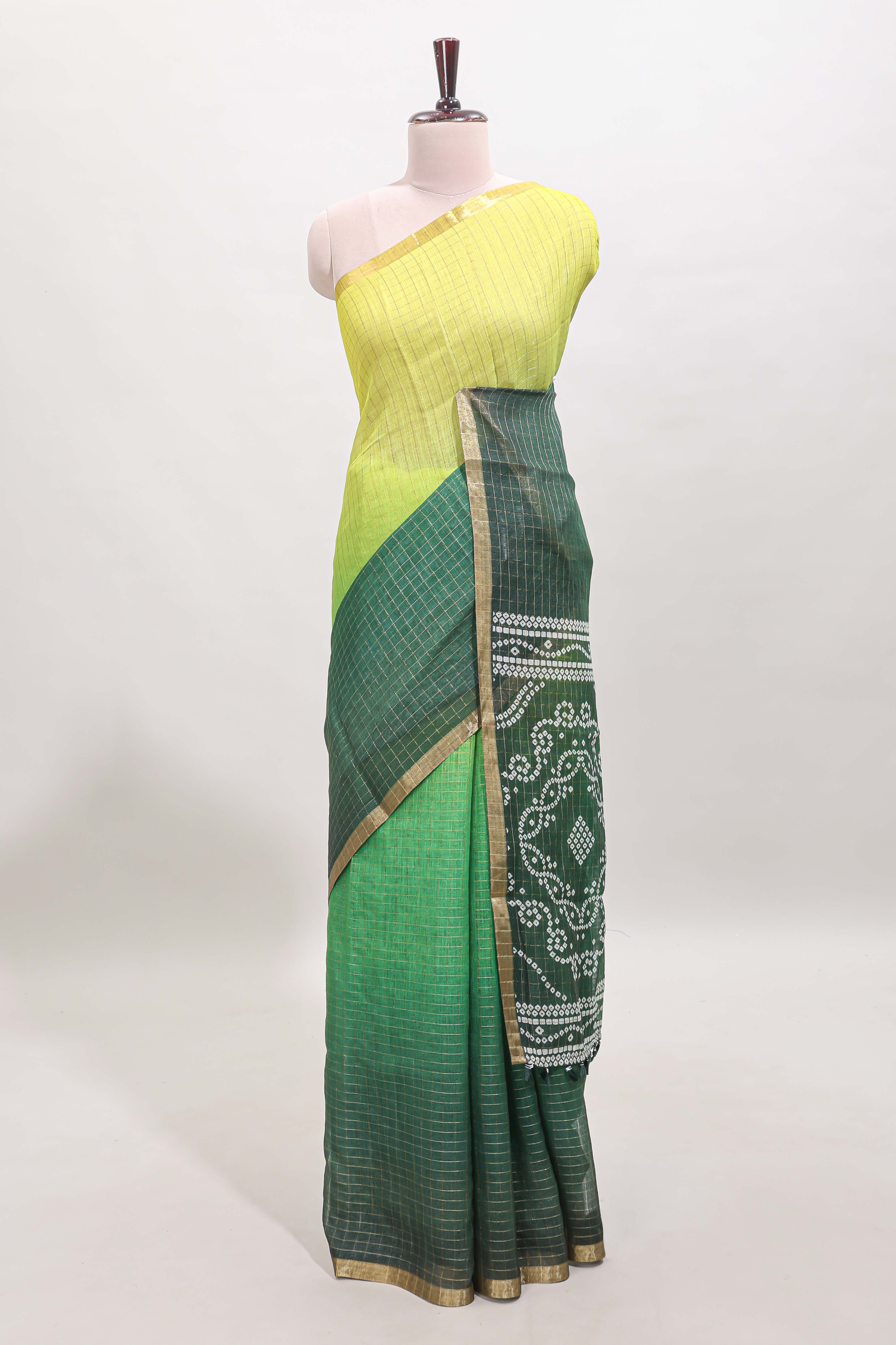 Yellow and green dual shade checked linen cotton saree with self zari border and matching blouse
