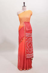 Orange and red dual shade checked checked linen cotton saree with self zari border printed blouse