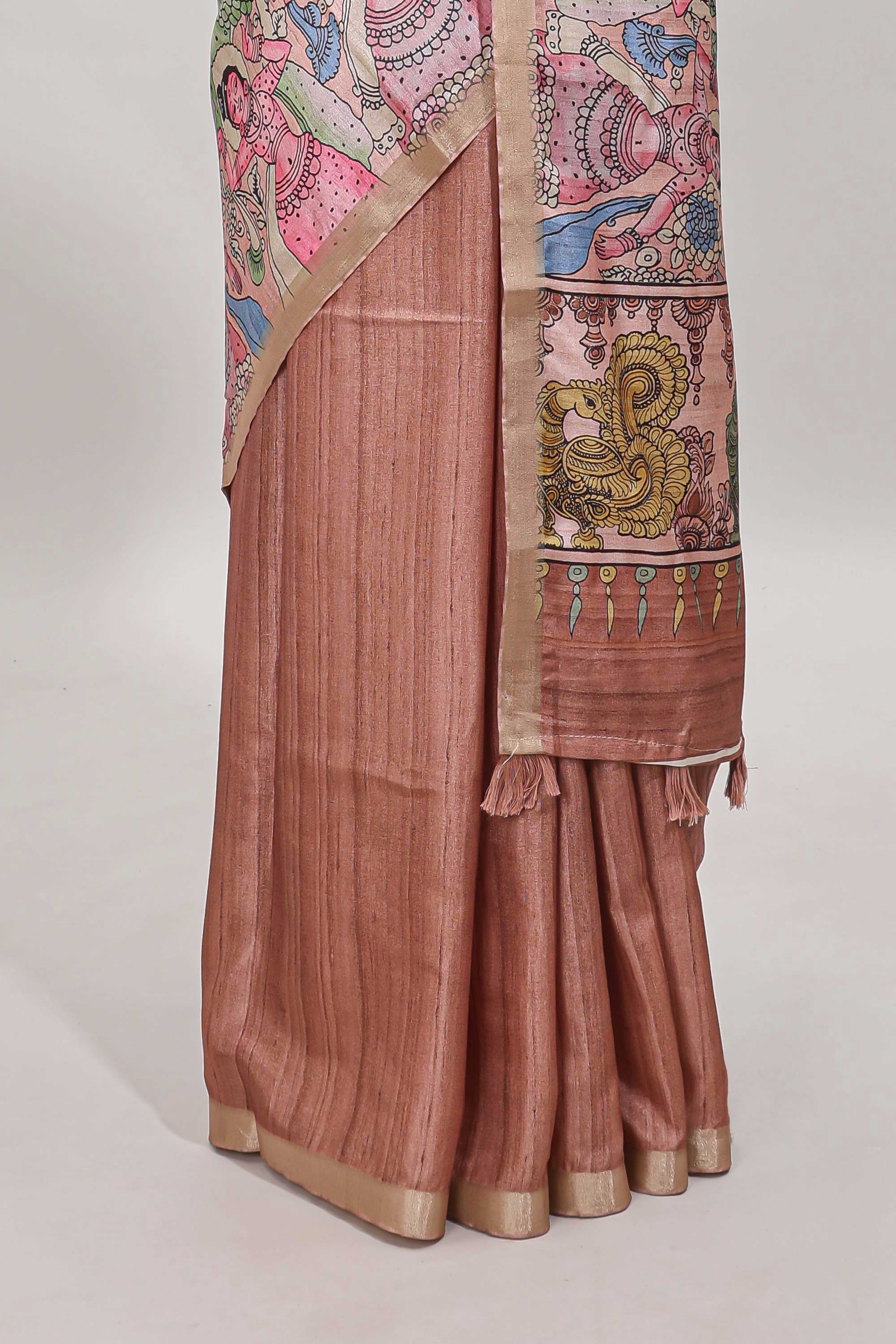 Peach kalamkari style art tussar saree with self zari border and blouse