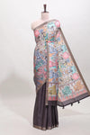 Dark brown kalamkari style tussar saree with self zari border and matching blouse