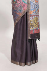 Dark brown kalamkari style tussar saree with self zari border and matching blouse