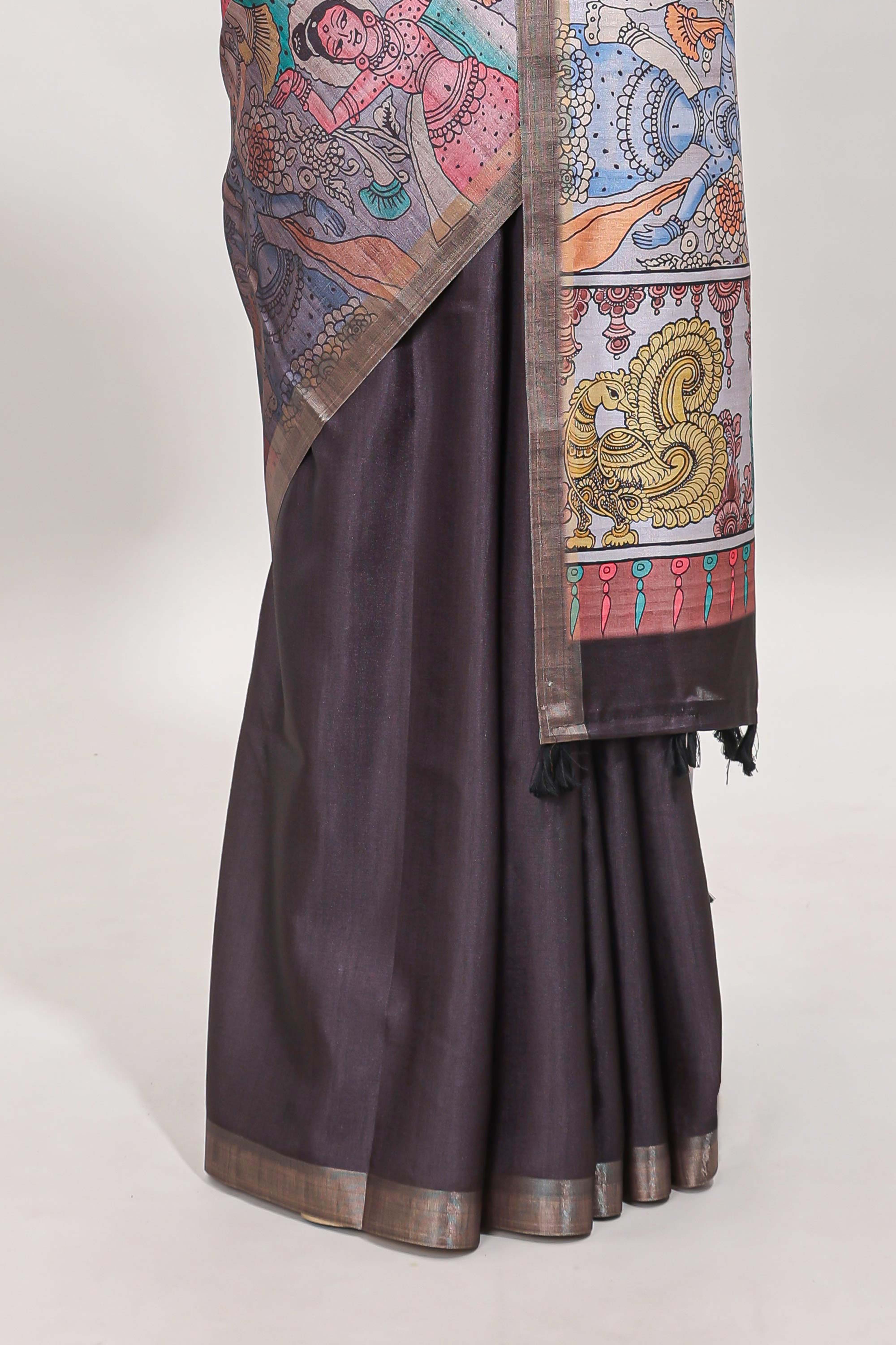 Dark brown kalamkari style tussar saree with self zari border and matching blouse