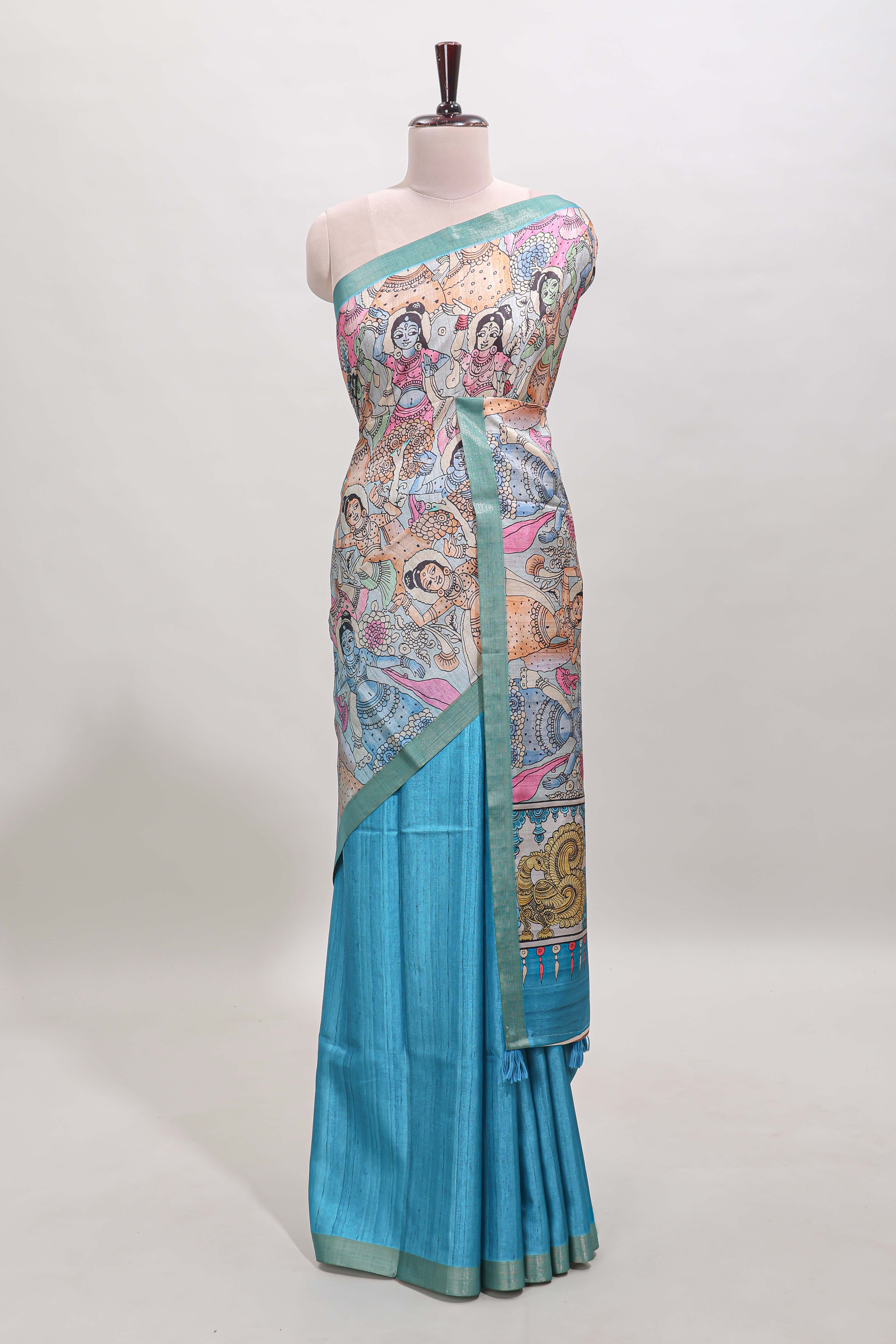 Blue kalamkari style art tussar saree with self zari border and blouse