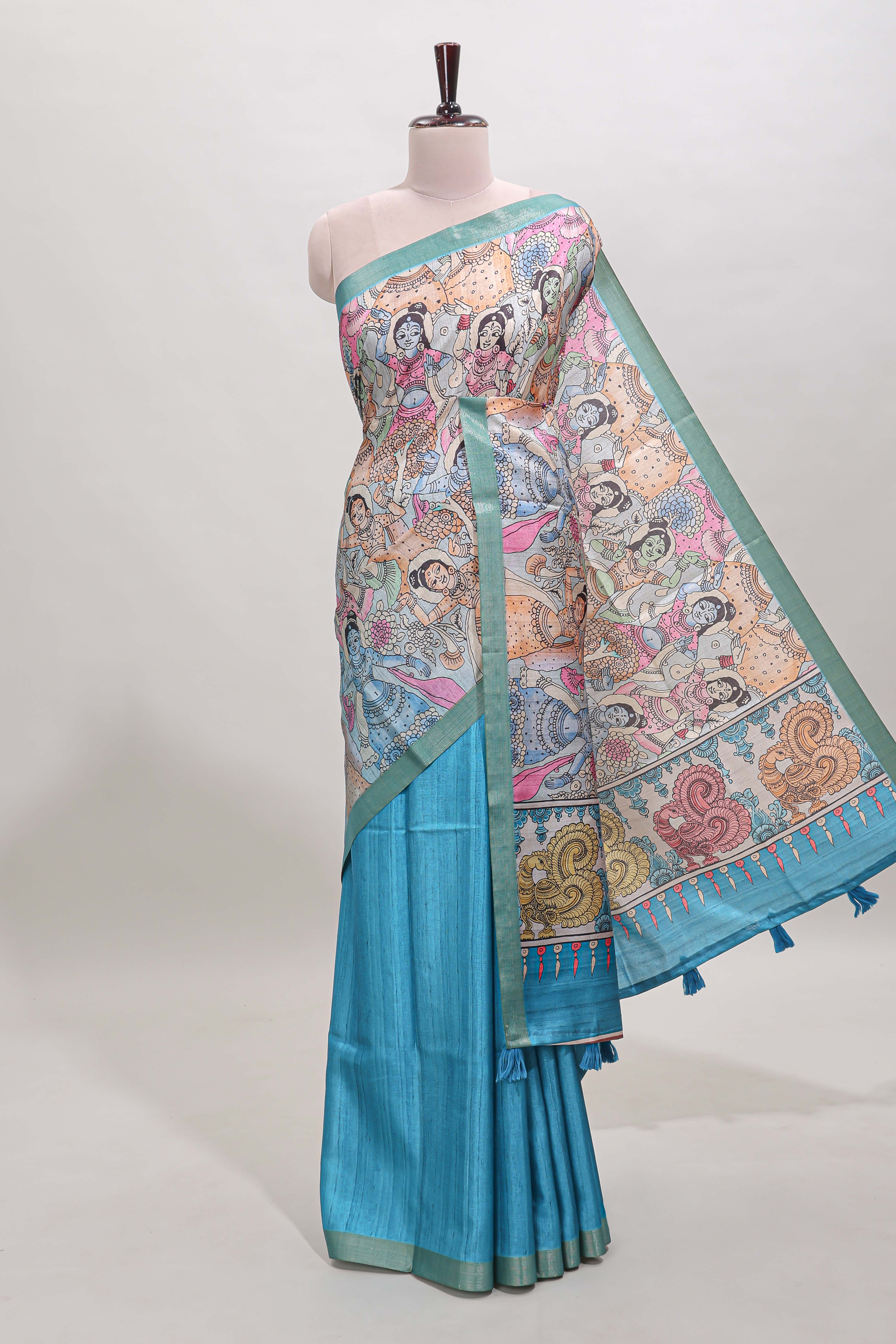 Blue kalamkari style art tussar saree with self zari border and blouse
