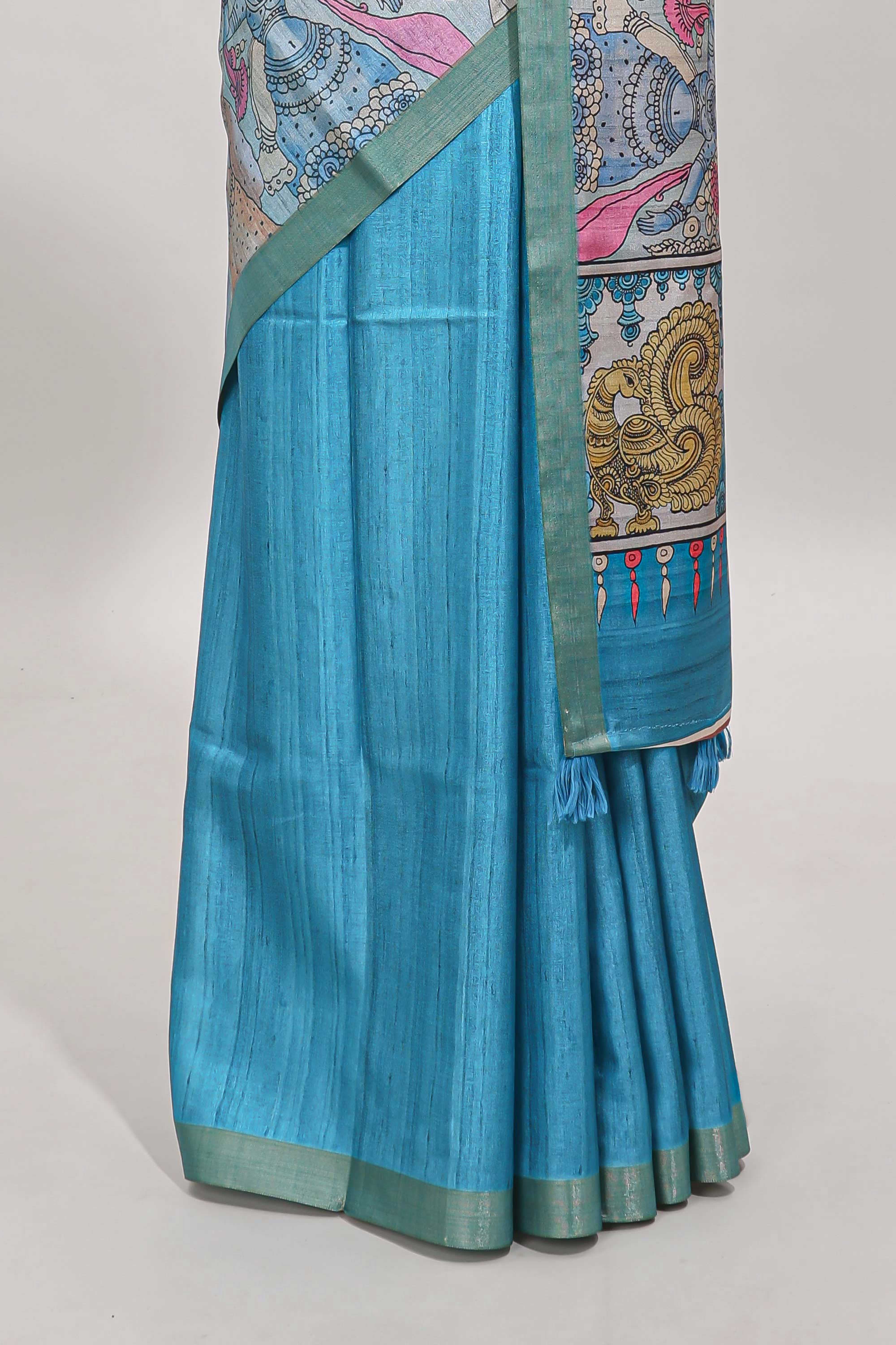 Blue kalamkari style art tussar saree with self zari border and blouse