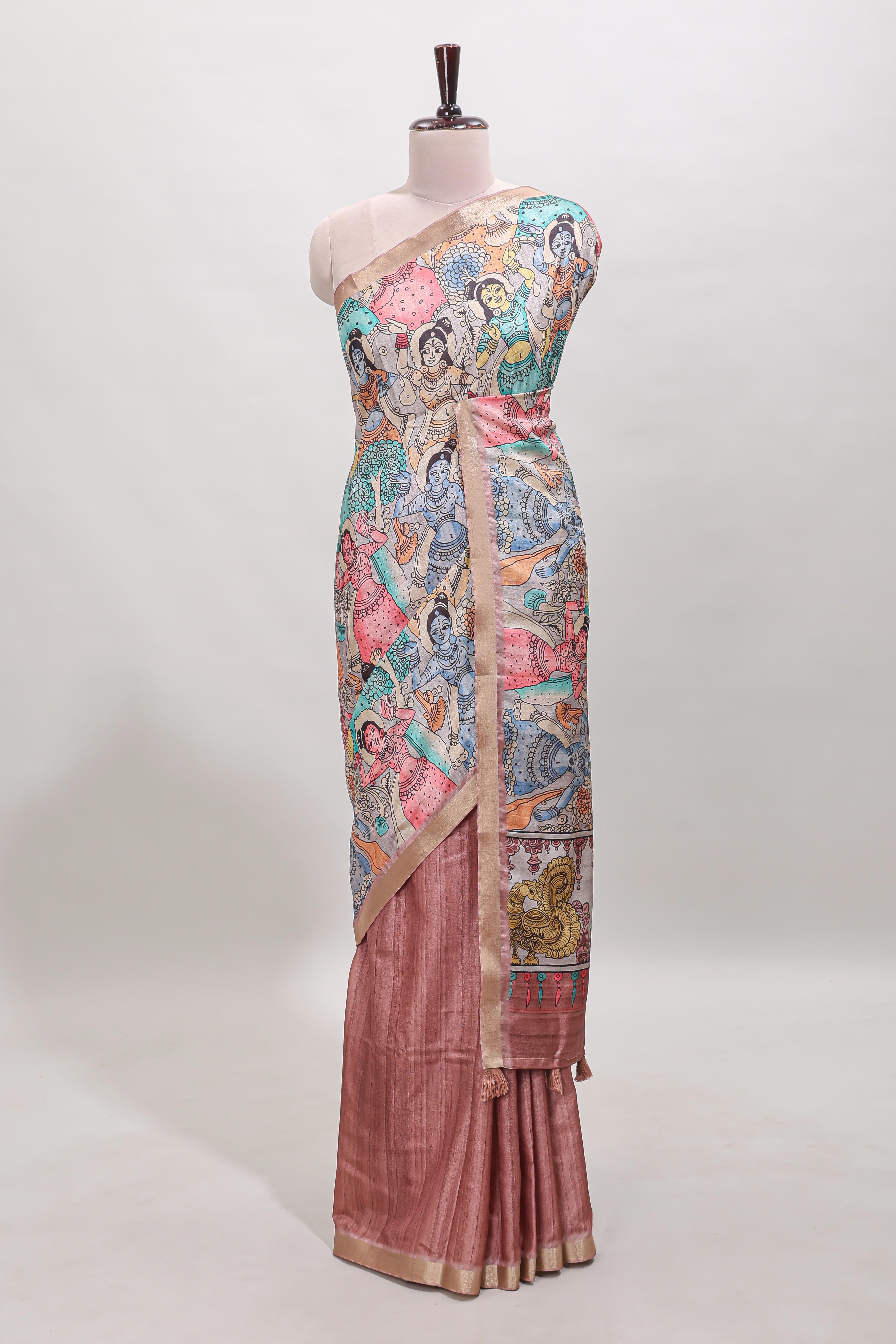 Peach kalamkari style tussar saree with self zari border and matching blouse