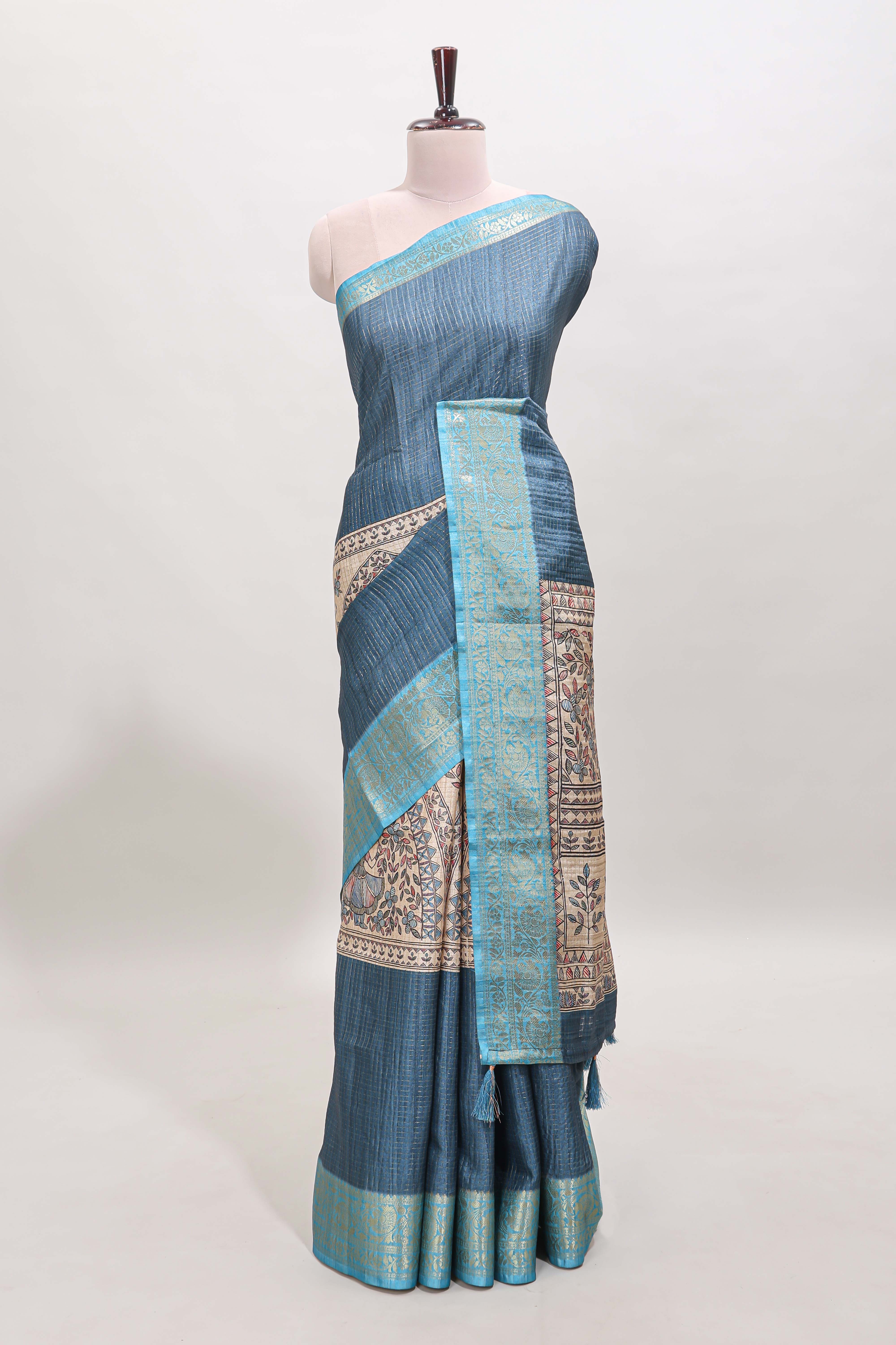 Blue ditsy floral print art tussar saree with contrast zari border and matching blouse