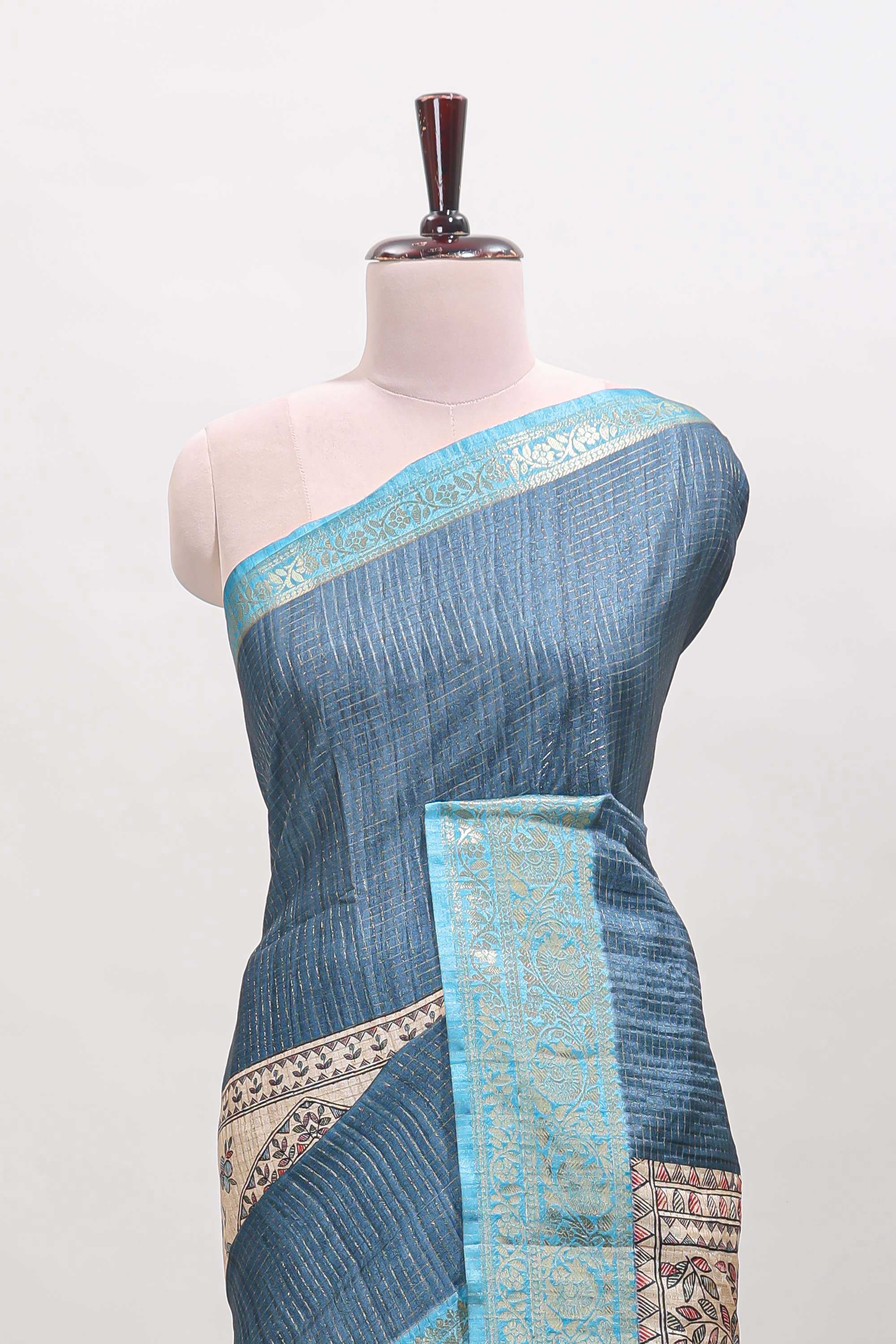 Blue ditsy floral print art tussar saree with contrast zari border and matching blouse
