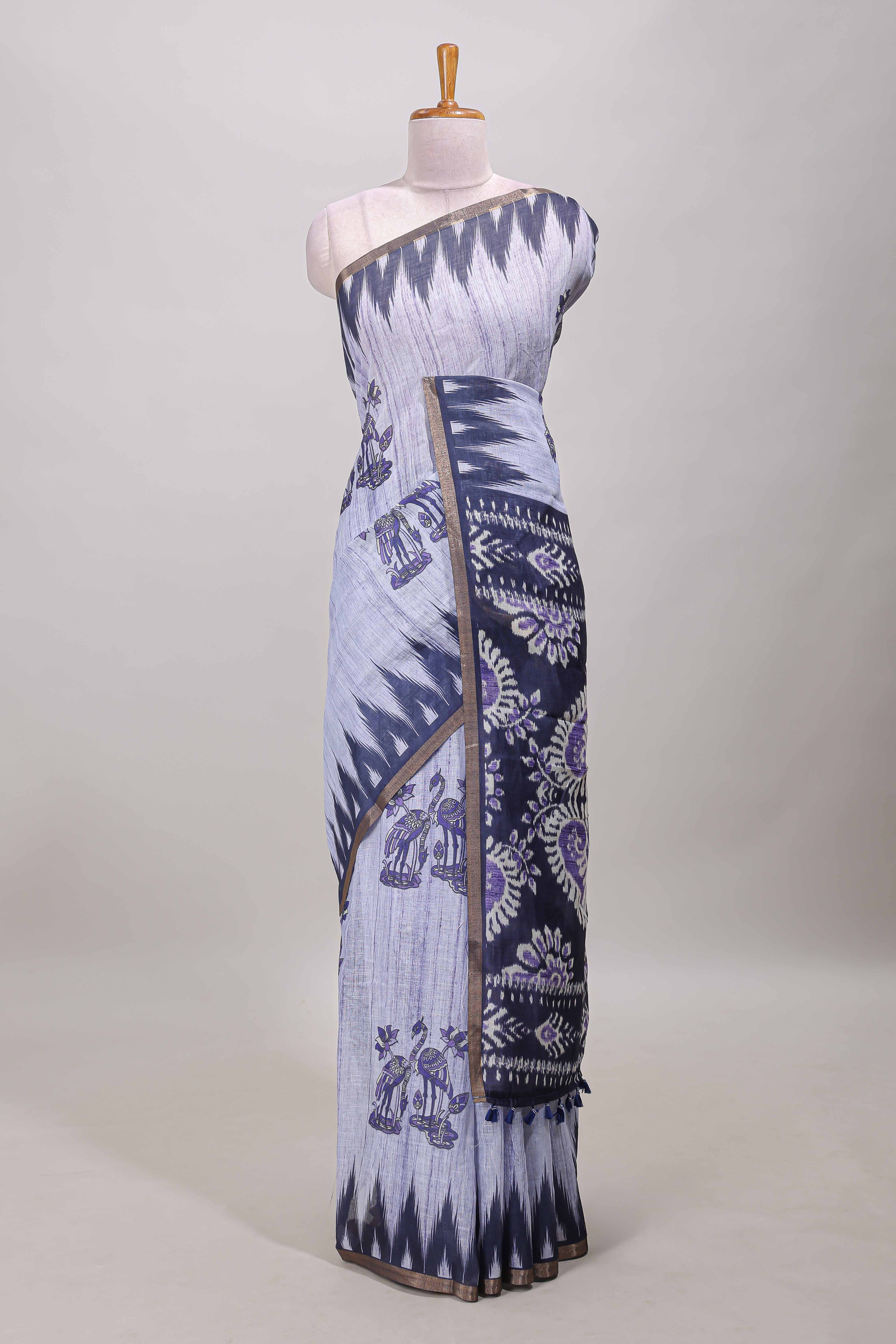 Lavender lotus and crane birds motis linen cotton saree with ikkat style self zari border and pallu