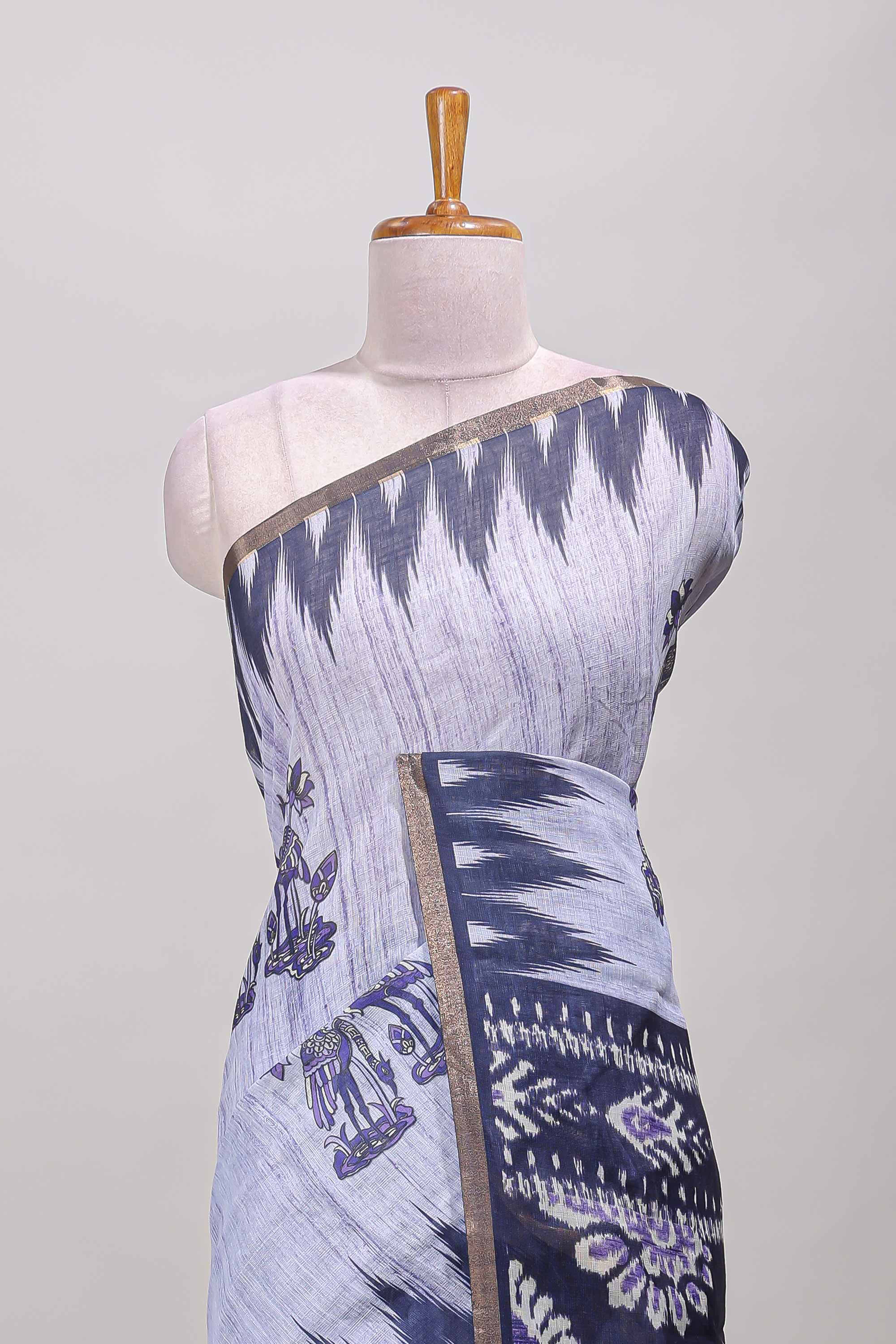 Lavender lotus and crane birds motis linen cotton saree with ikkat style self zari border and pallu