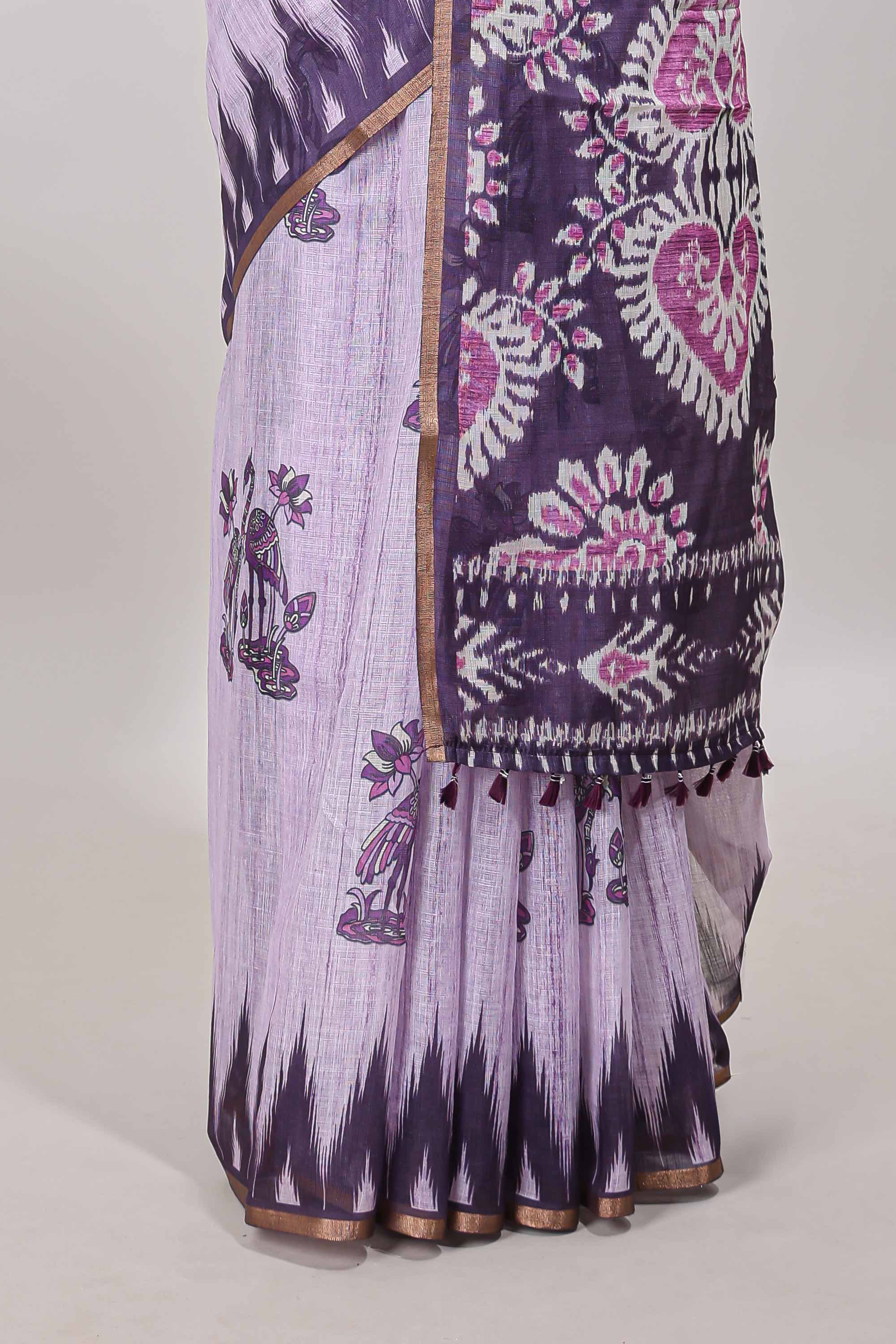 Purple lotus and crane birds motis linen cotton saree with ikkat style self zari border and pallu