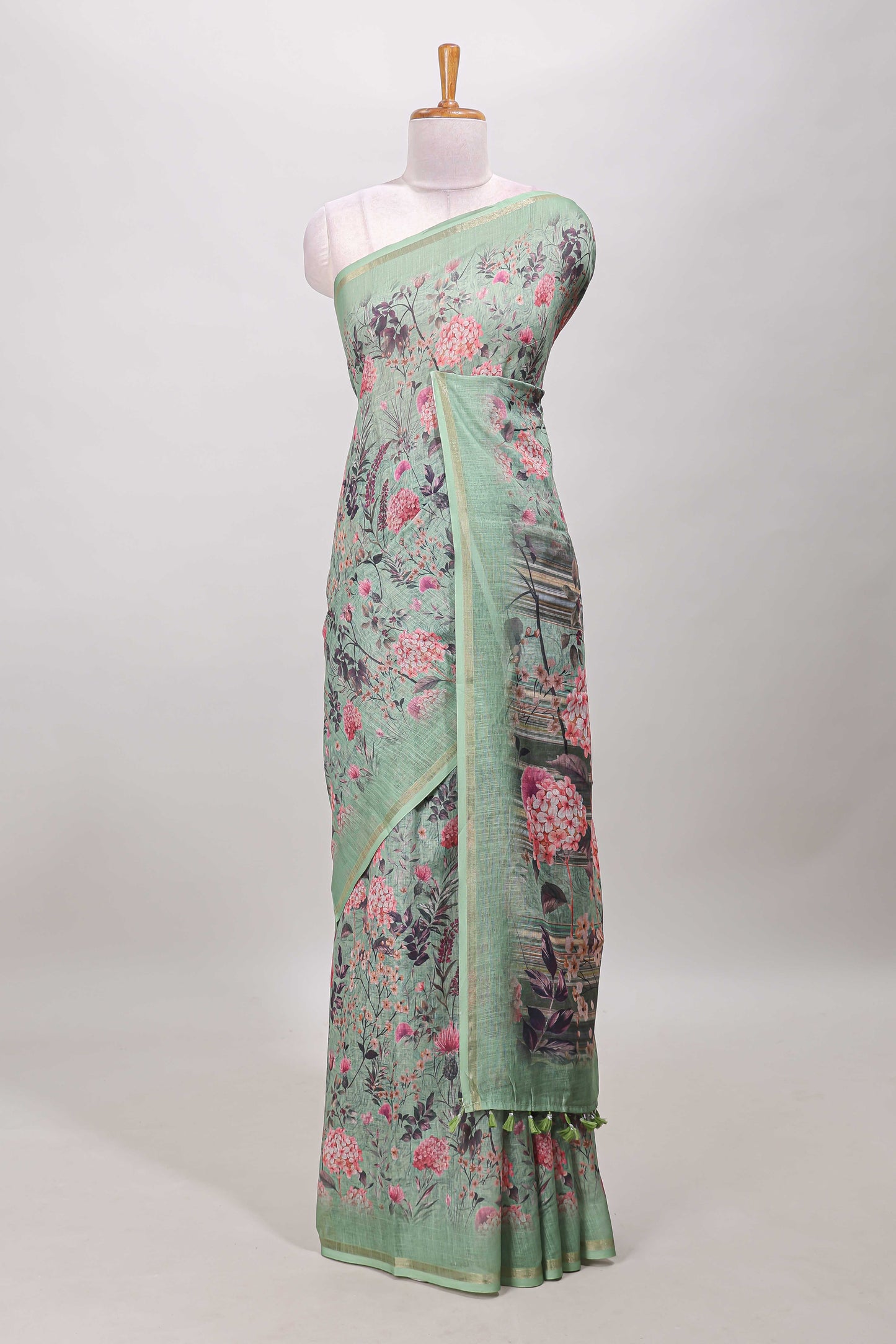 Green floral design linen cotton saree with self zari border and floral printed pallu