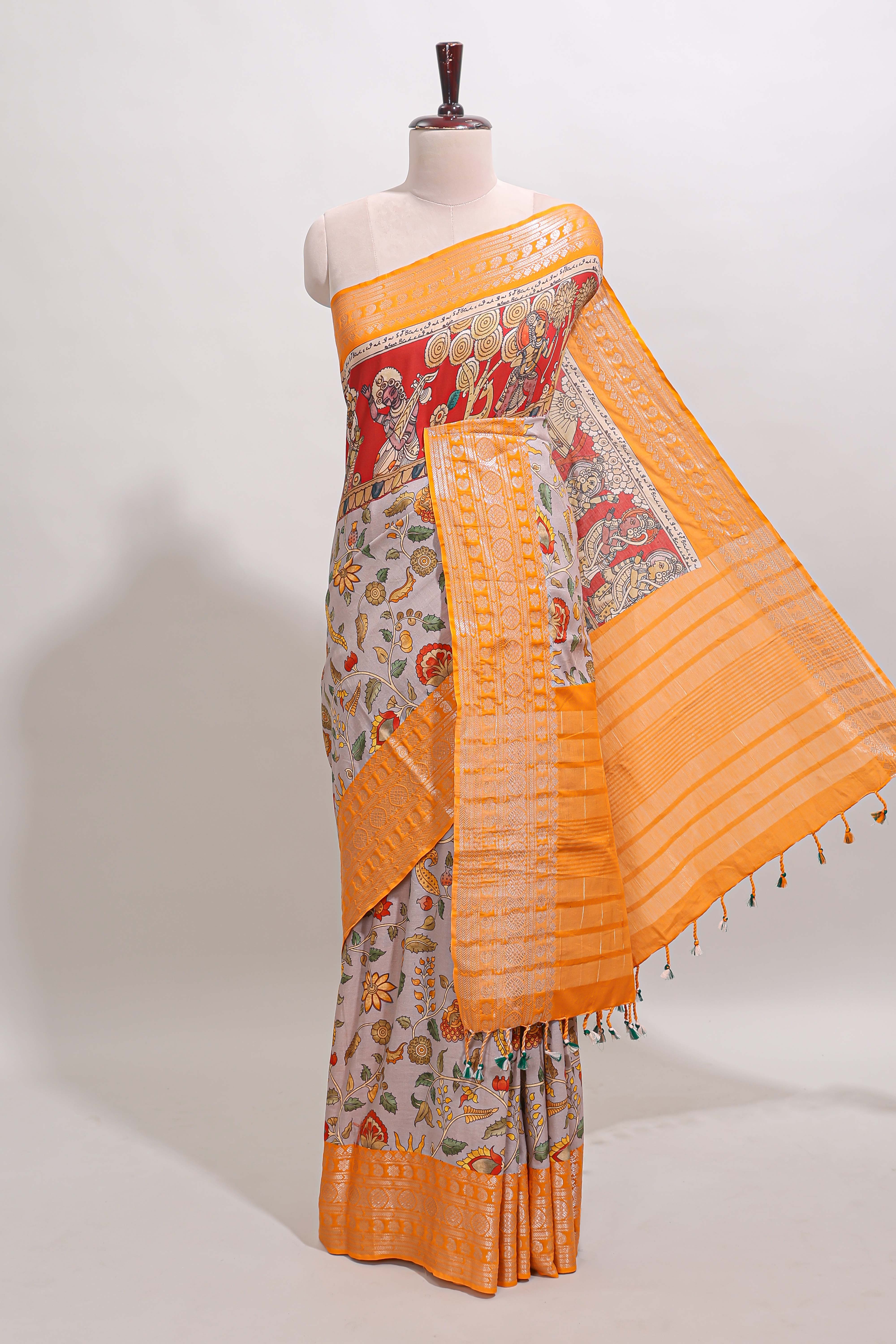 Grey kalamkari style chirala cotton saree with contrast zari border, striped pallu and printed blouse