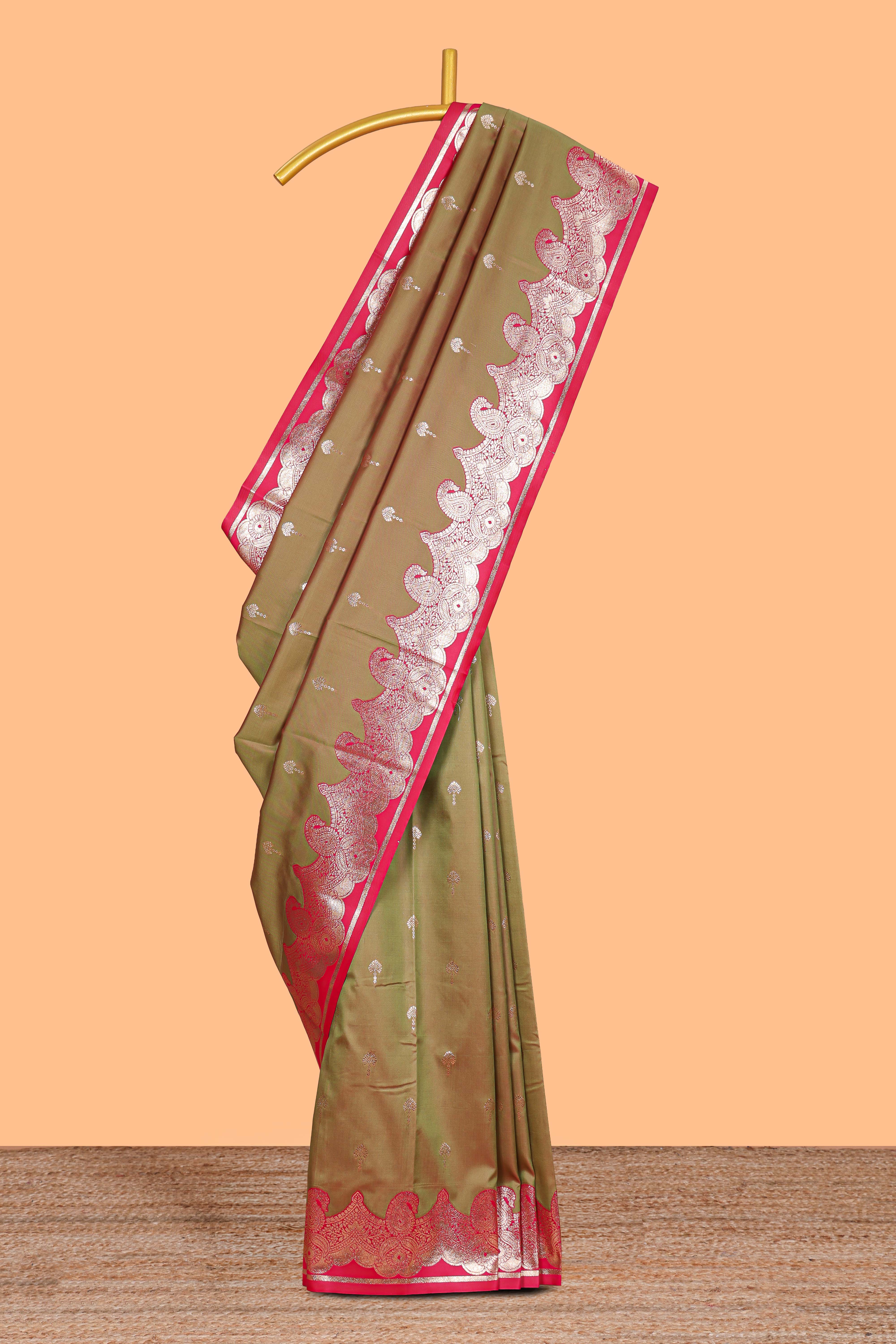 Olive Gold with Pink semi soft silk Woven Zari-Inspired Motifs and paisley Weave Design border with contrast blouse