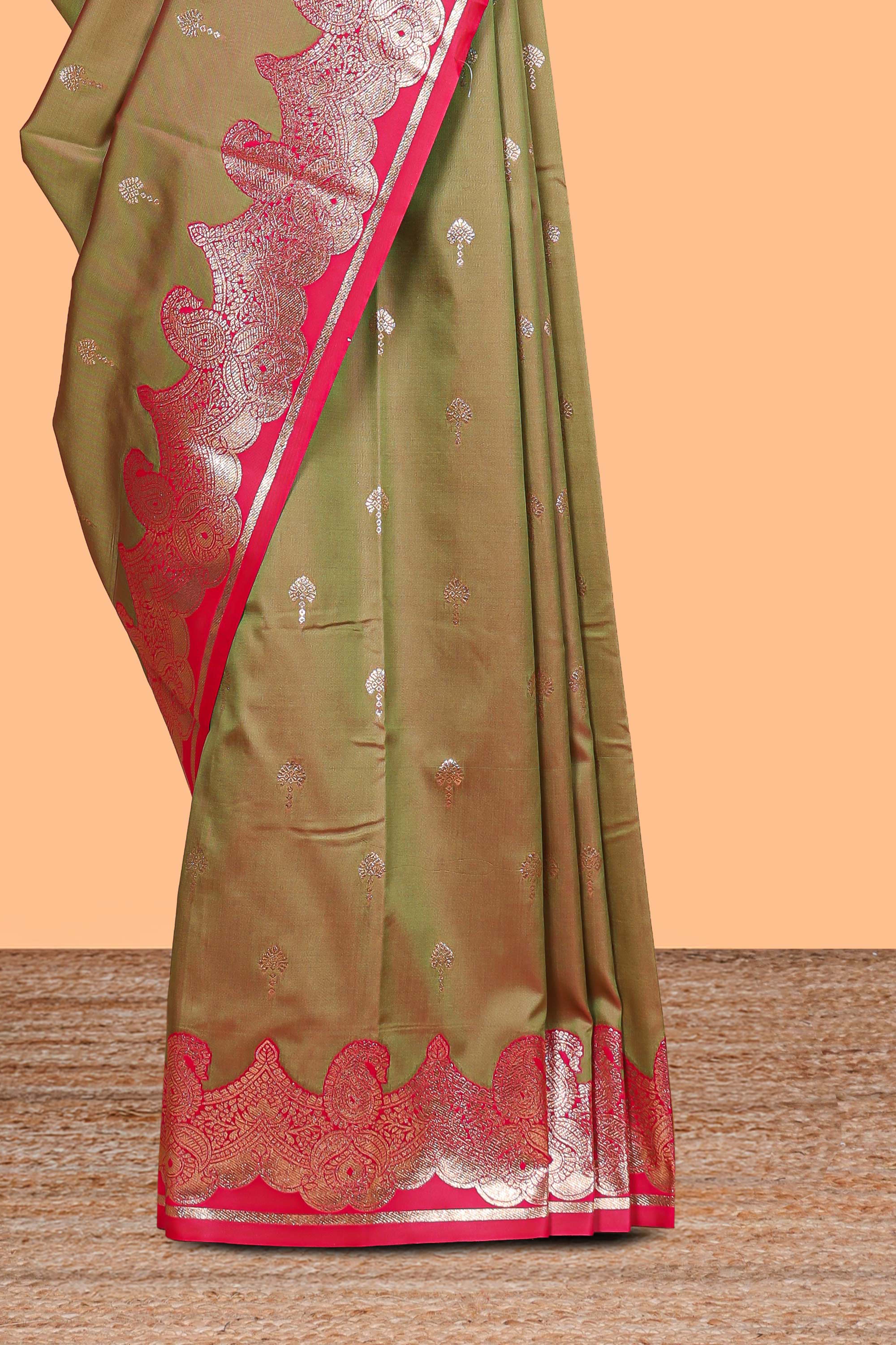 Olive Gold with Pink semi soft silk Woven Zari-Inspired Motifs and paisley Weave Design border with contrast blouse