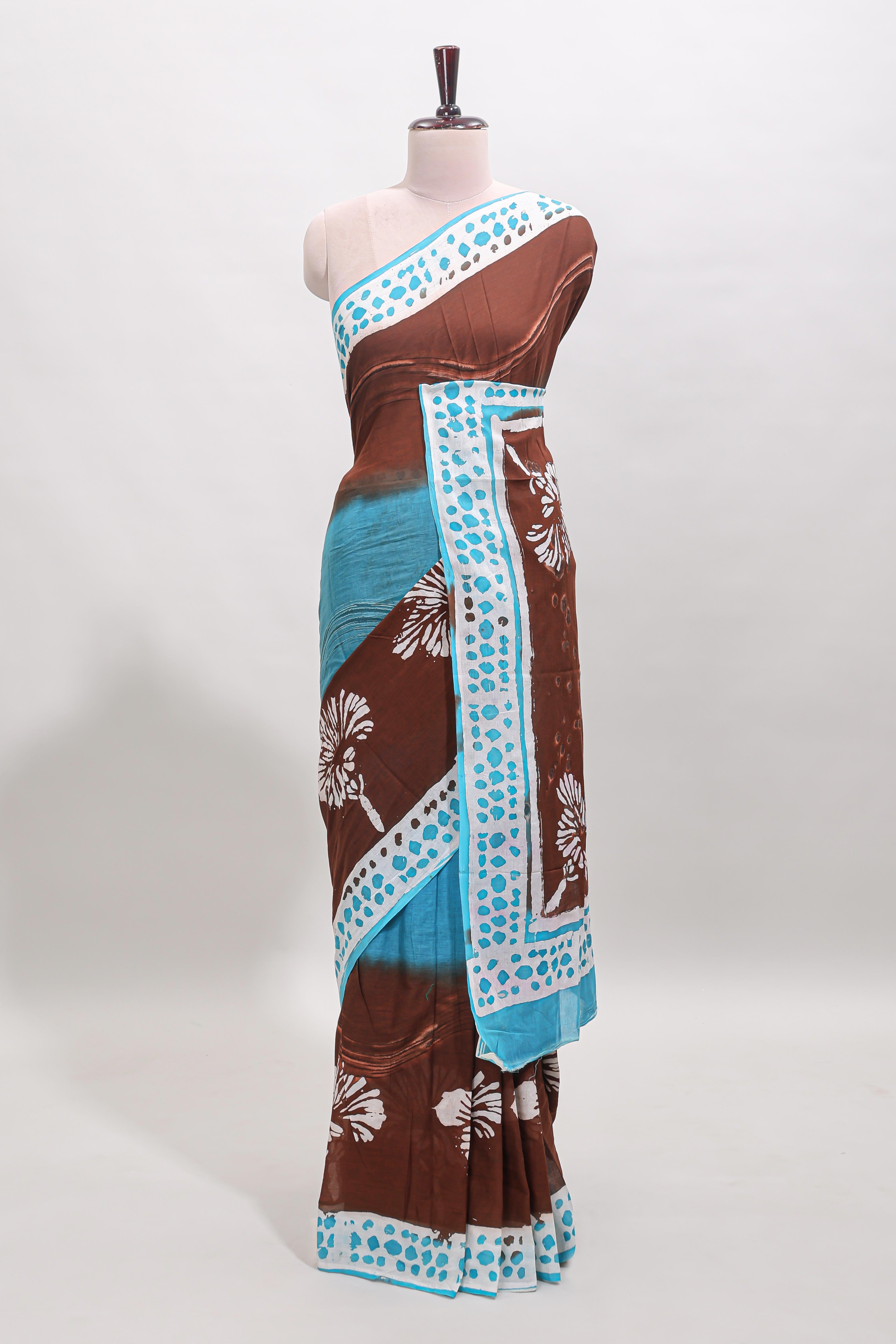 Chocolate brown and blue dual shade floral motifs mul mul cotton saree with self border and matching blouse