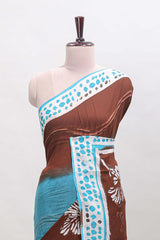 Chocolate brown and blue dual shade floral motifs mul mul cotton saree with self border and matching blouse