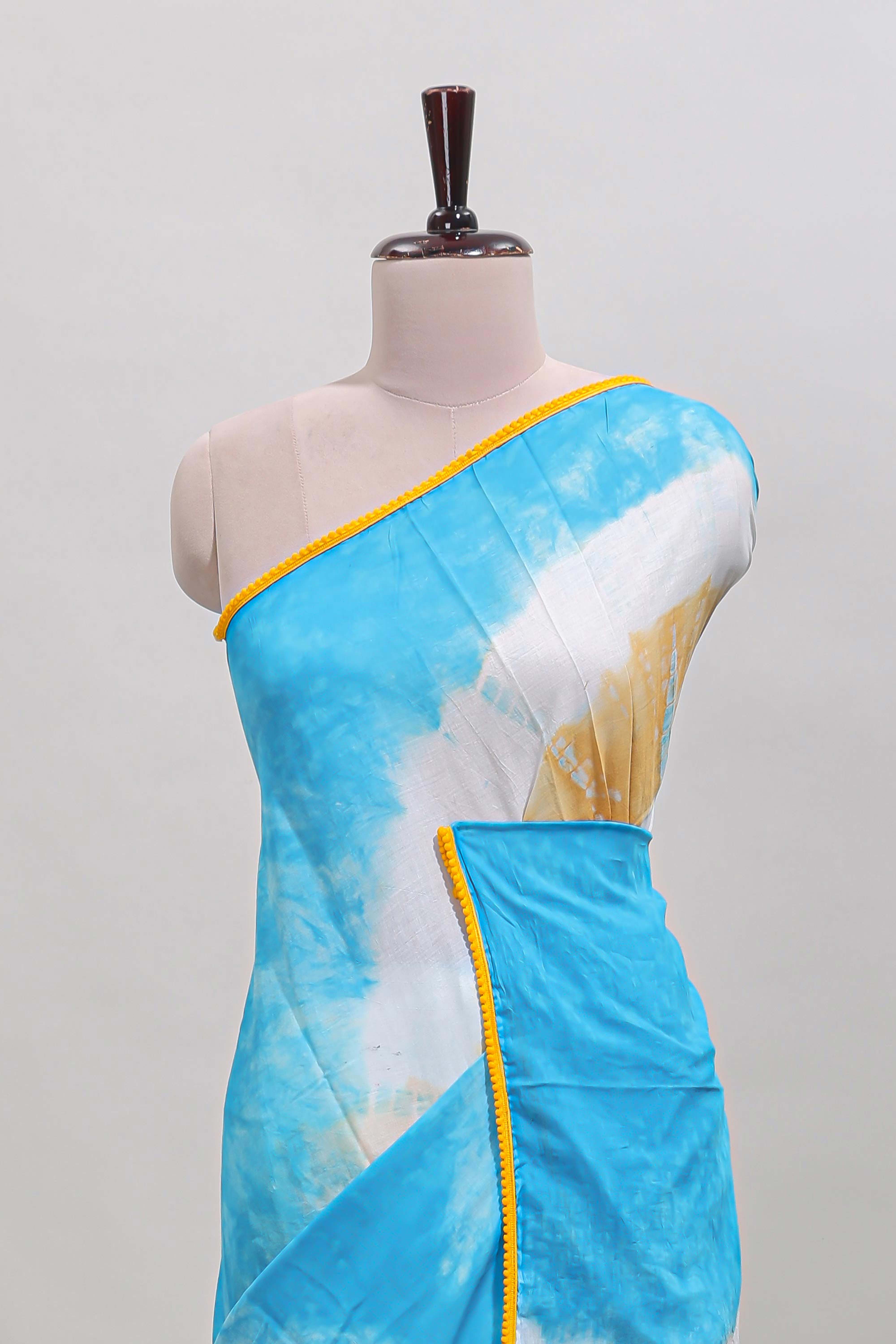 Blue shibori printed mul mul cotton saree with contrast scallop border and blouse