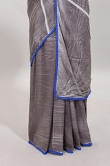 Grey geometric design mul mul cotton saree with scallop border and matching blouse