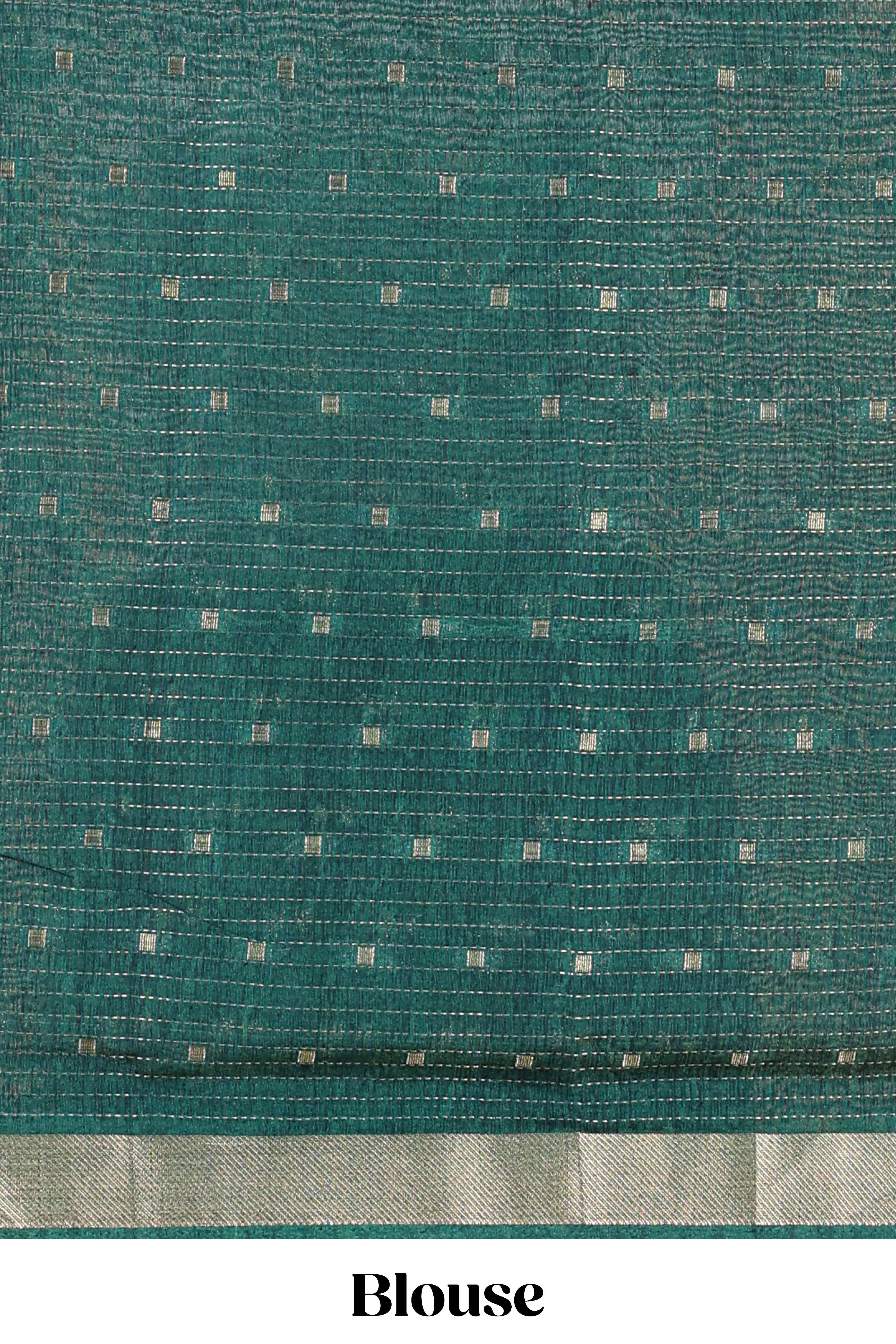 Green assam silk abstract face print saree with contrast zari border and pallu